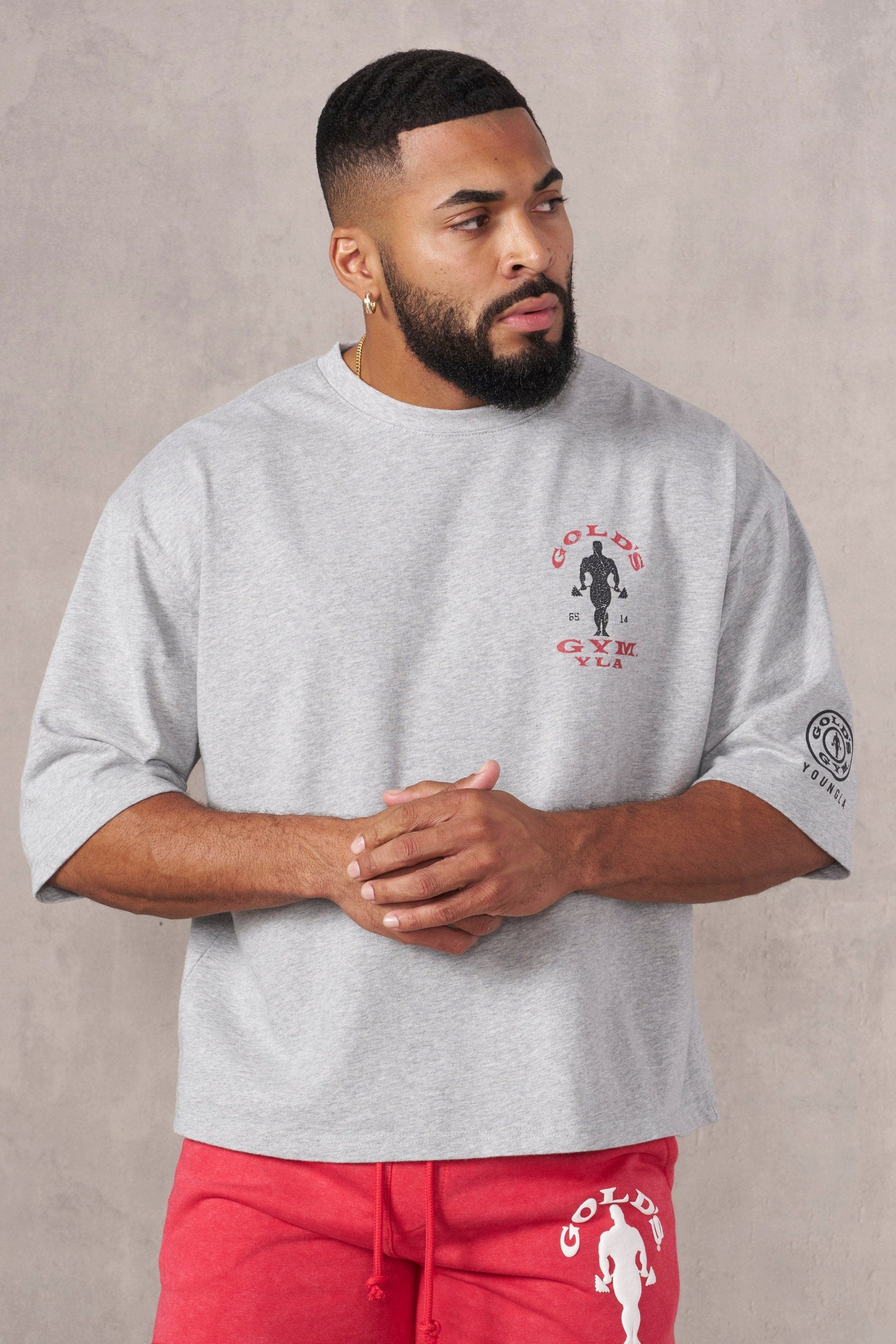 Front view of Golds Gym tee with boxy silhouette styled for streetwear