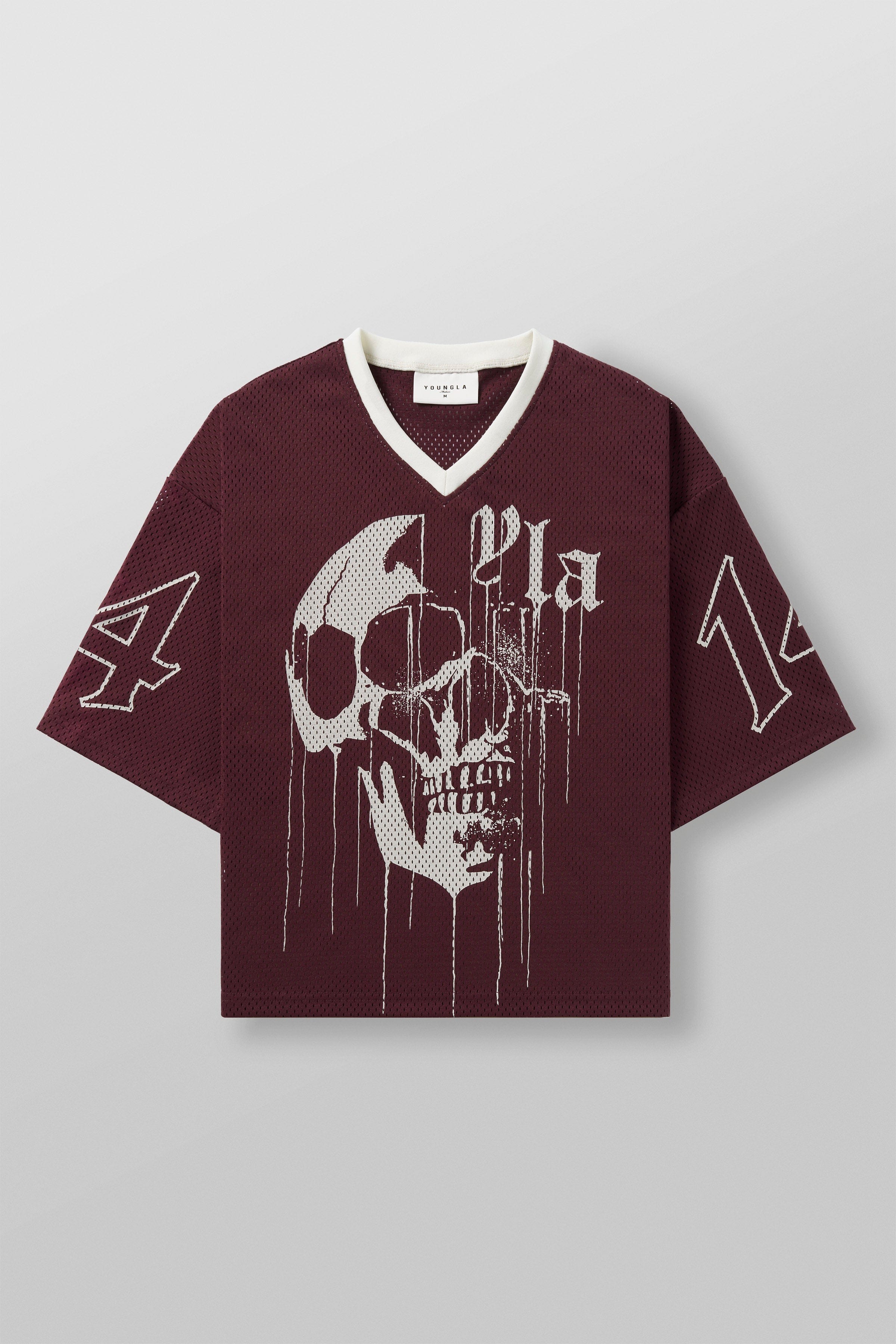 Close-up of the dripping skull graphic on the chest of the football jersey