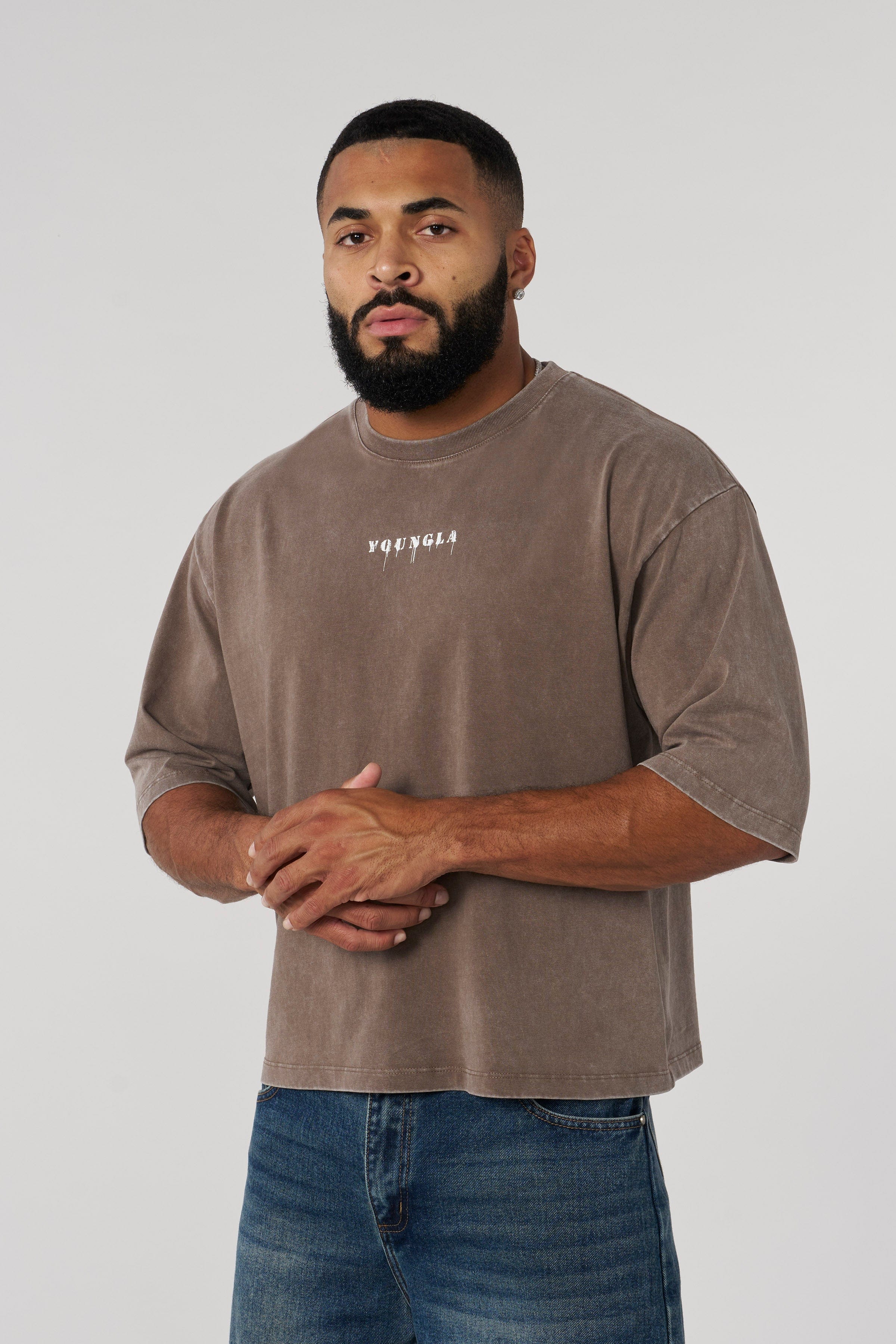 Front view of vintage acid-washed cropped t-shirt in casual setting