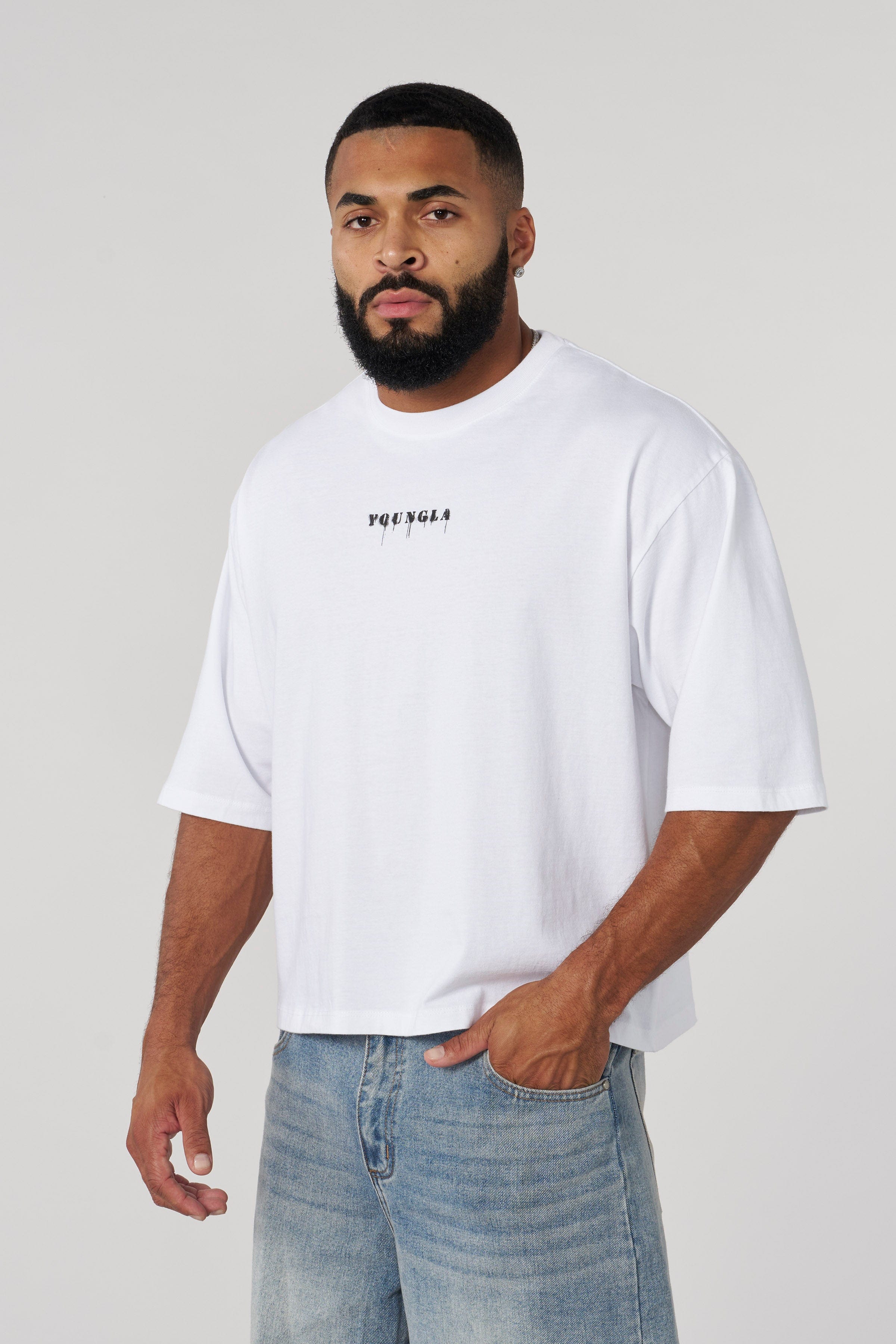 Front view of vintage acid-washed cropped t-shirt in casual setting