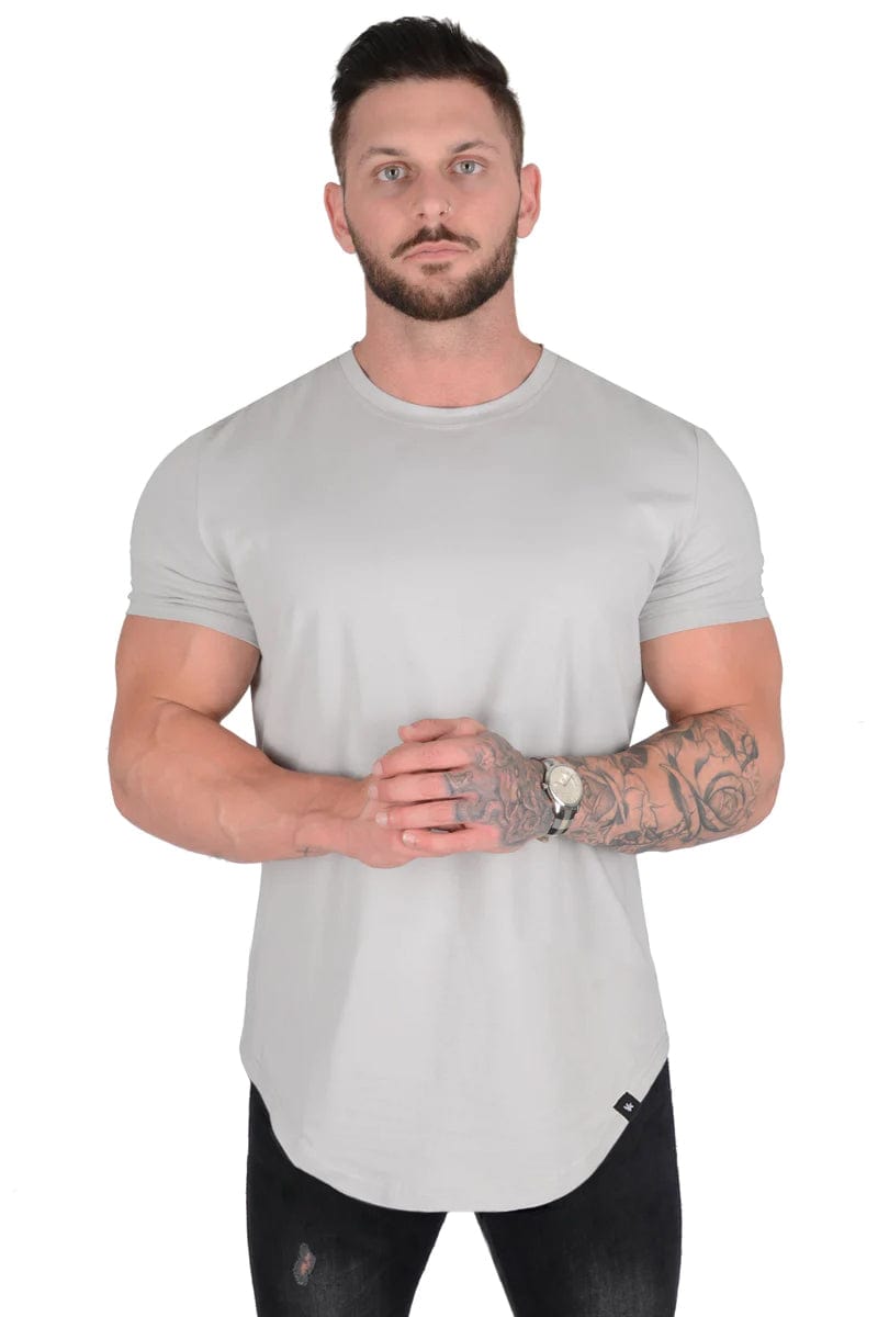 Close-up of muscle fit scallop tee showcasing fabric texture and fit.