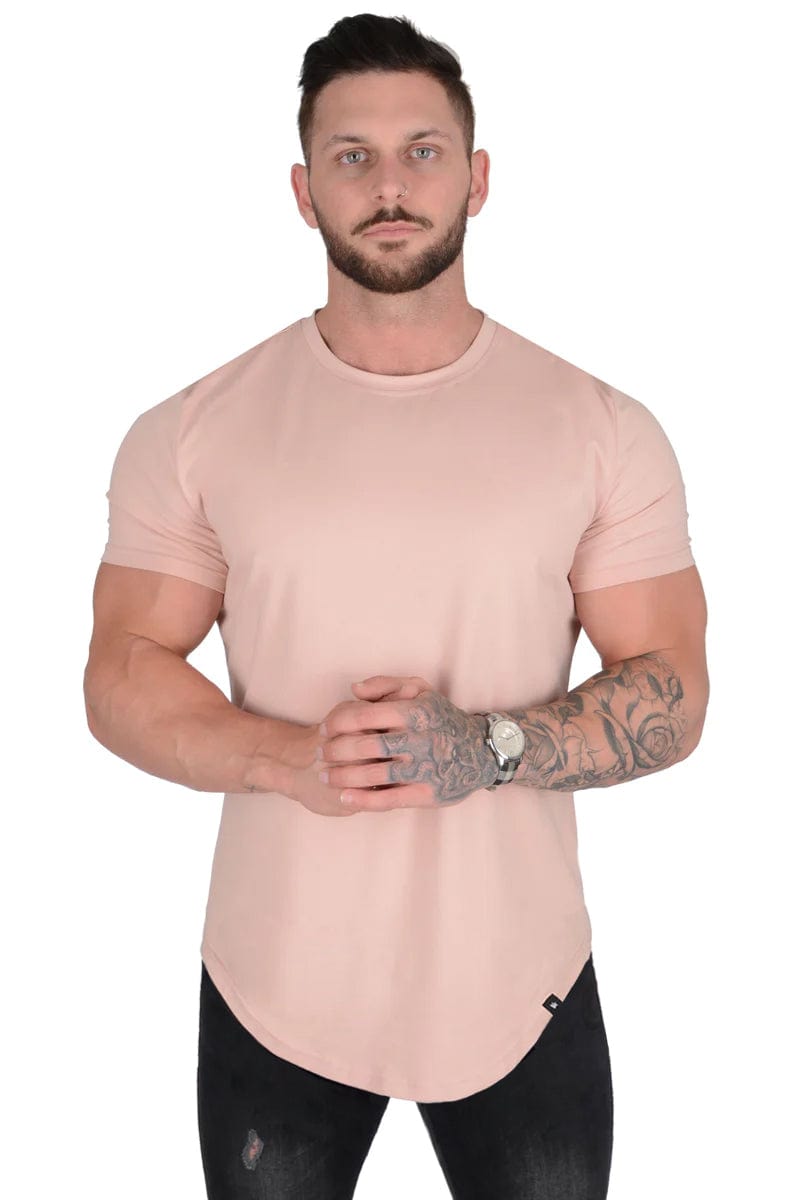 Model wearing fitted gym tee, highlighting its design and V-shape fit.