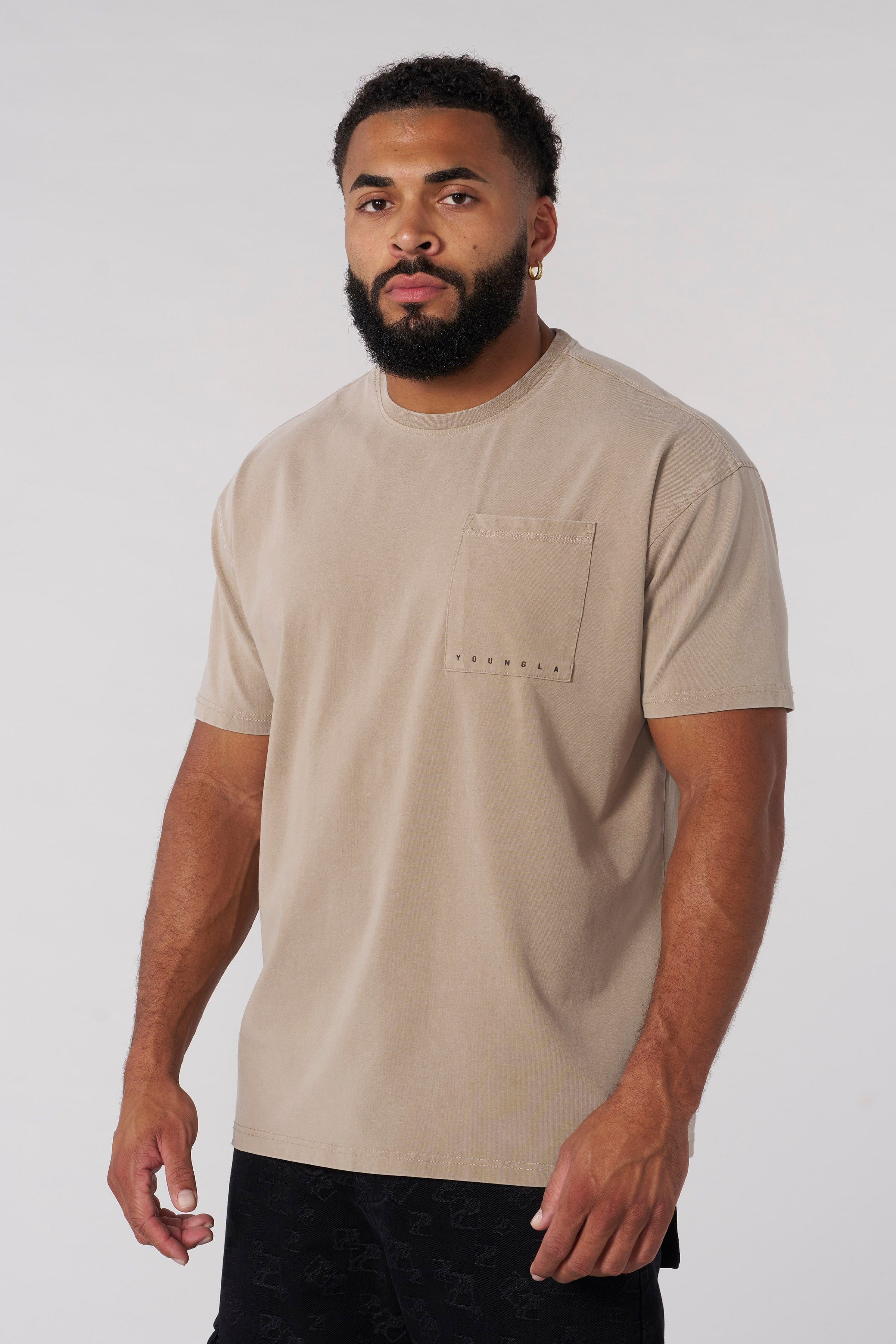 Back view showing tailored tee fit around shoulders and arms