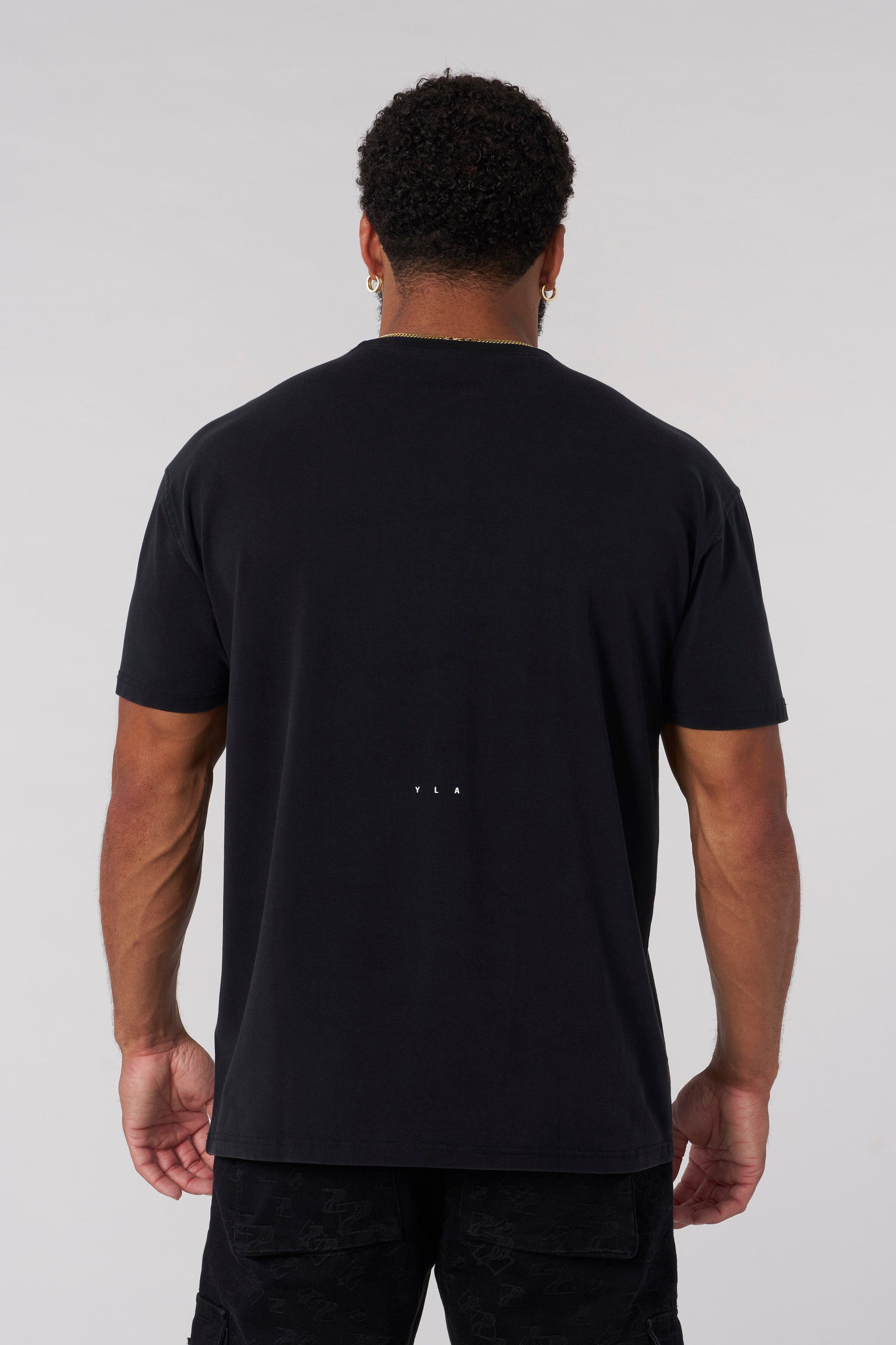 Close-up of pocket t-shirt detail and textured cotton blend