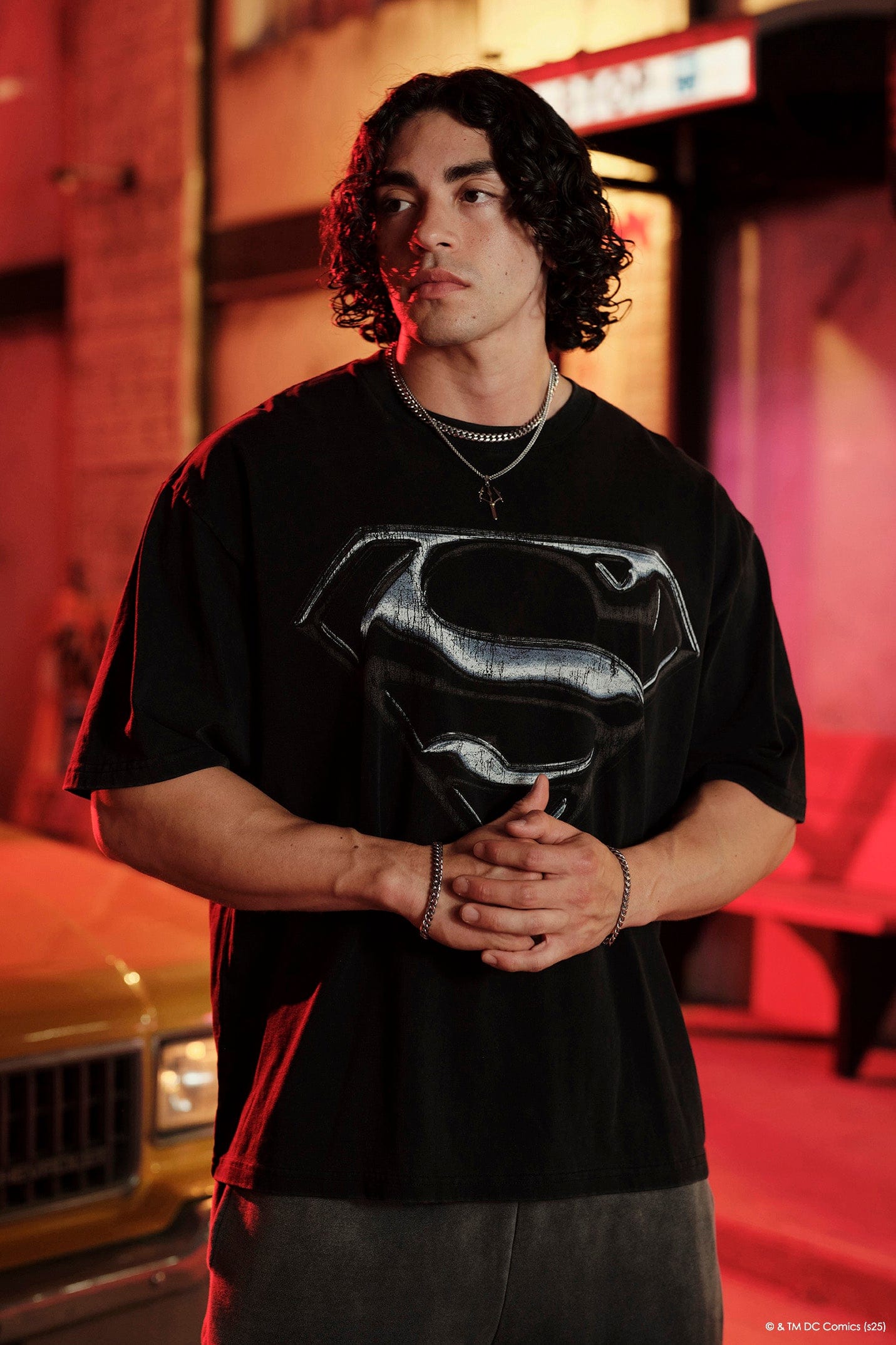 Close-up of the unique Superman design on the vintage graphic tee.