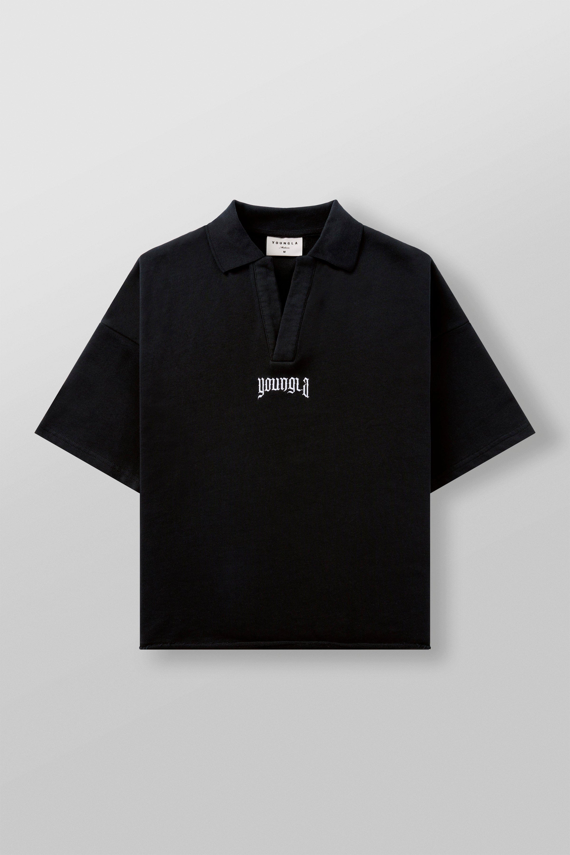 Front view of oversized polo shirt in bold stripes, casual style