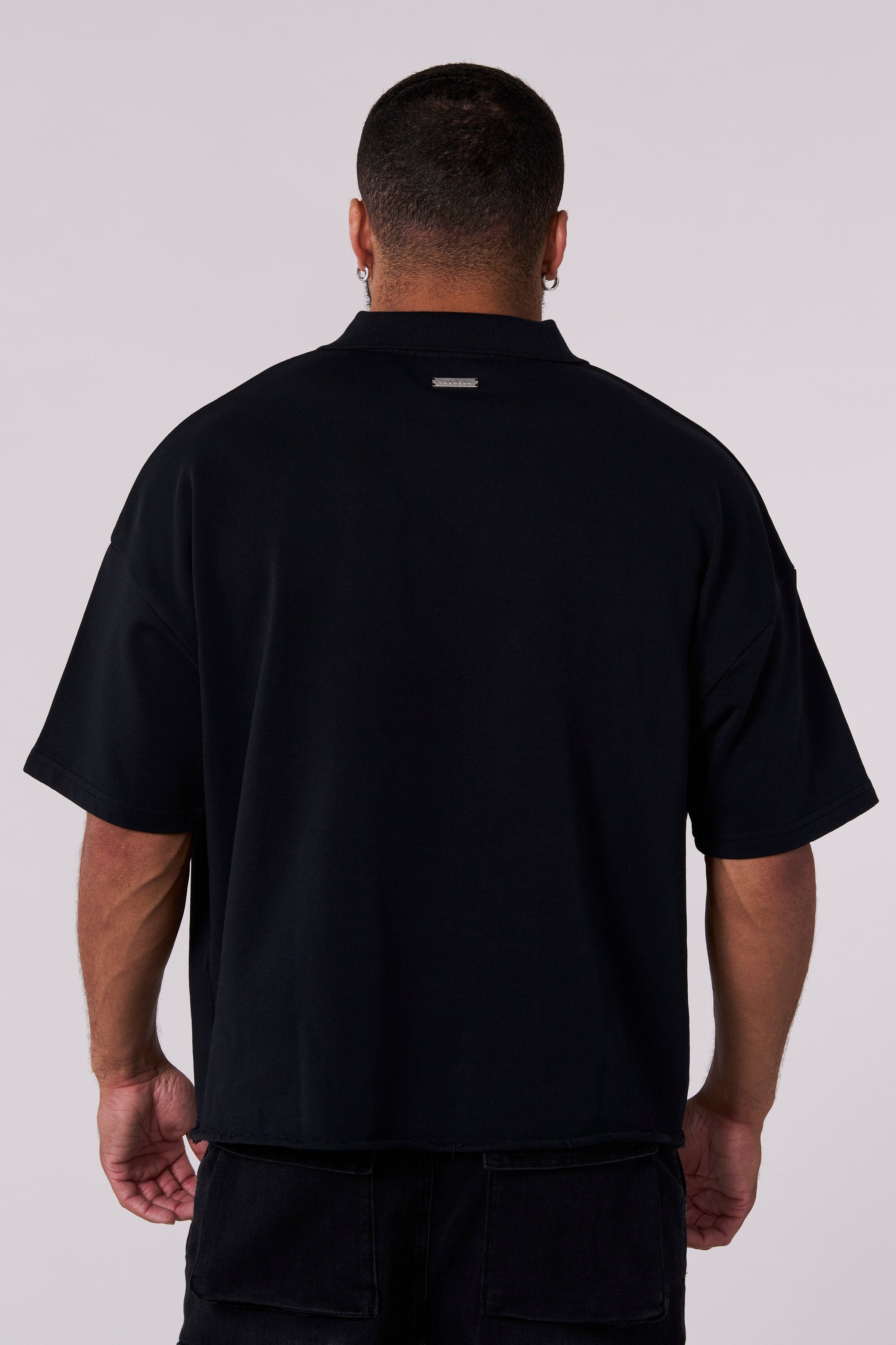 Close-up of fabric texture on oversized polo t shirt, 350 GSM