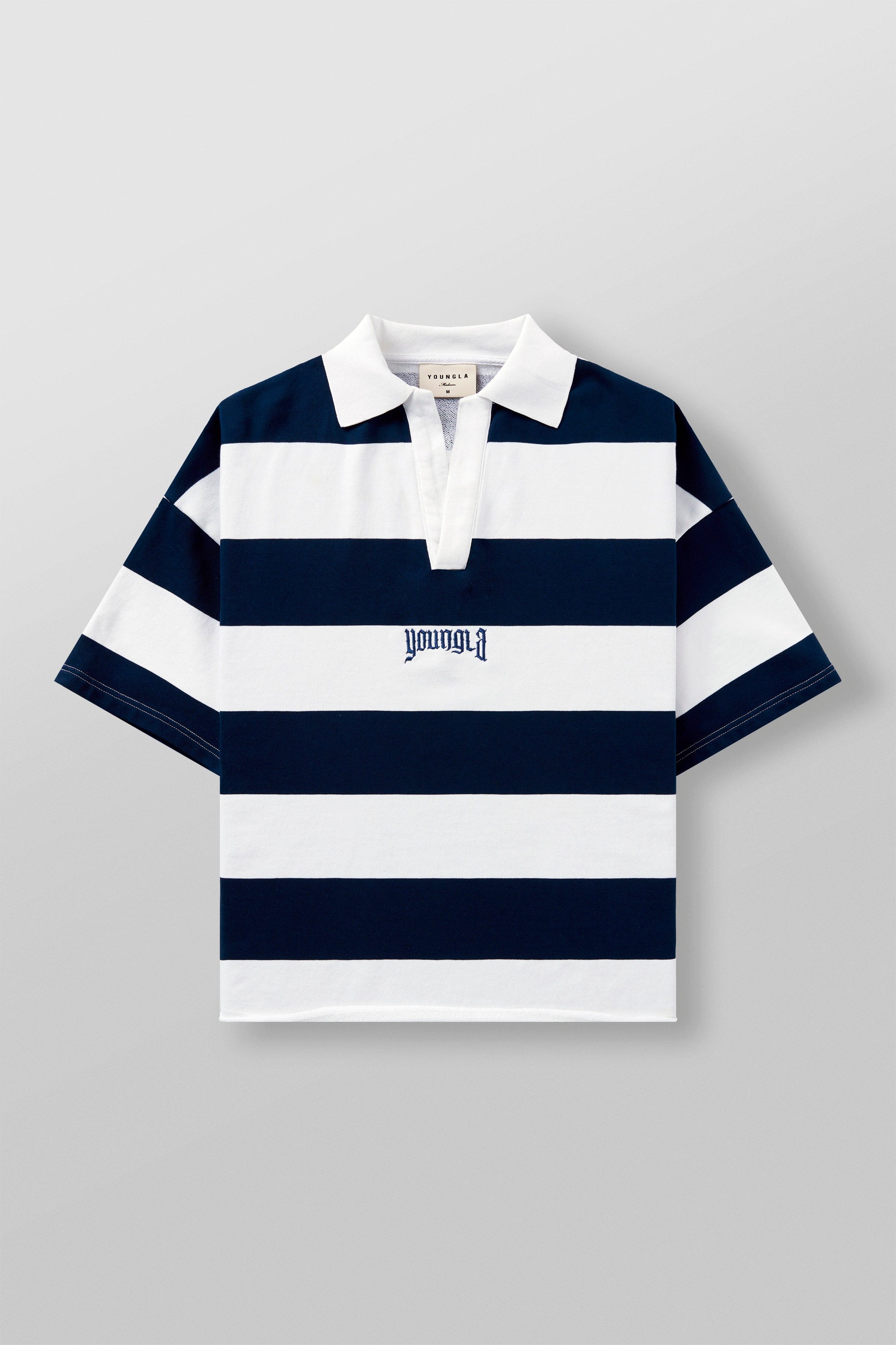 Front view of oversized polo shirt in bold stripes, casual style