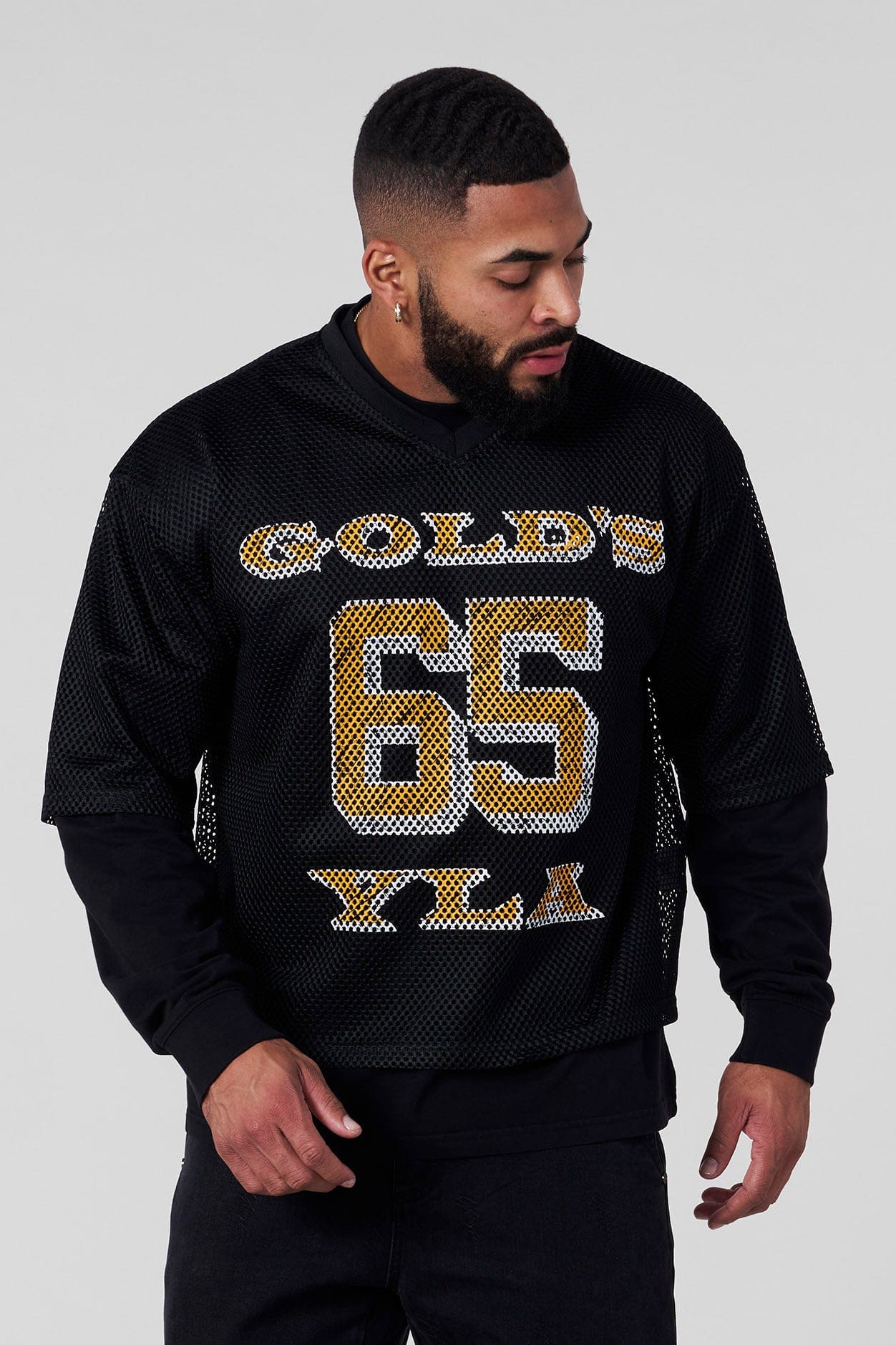 Front view of the Golds Gym x YoungLA Mesh Jersey in Black, perfect for workouts.