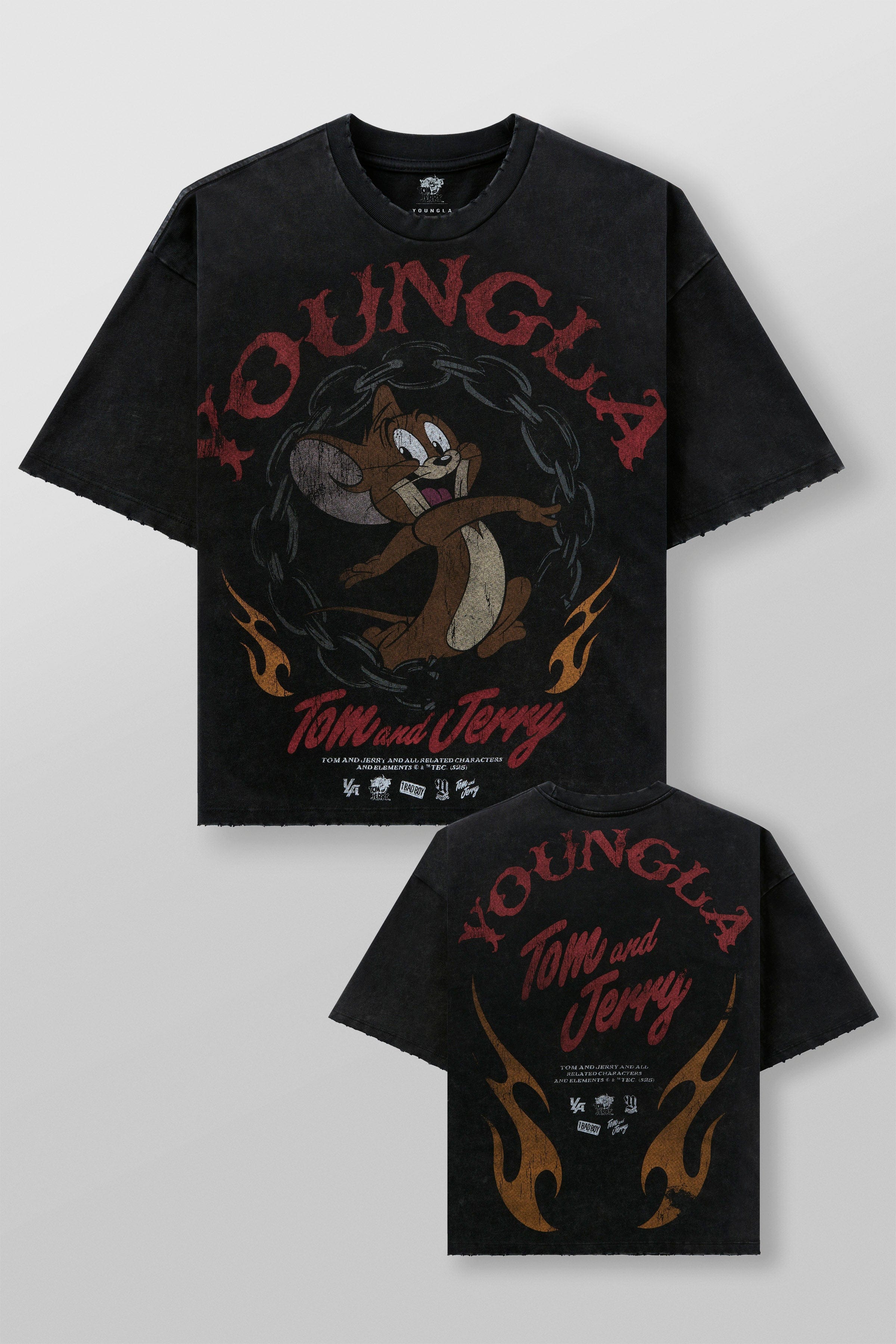 Model wearing oversized T shirt with nostalgic Tom & Jerry design in casual setting