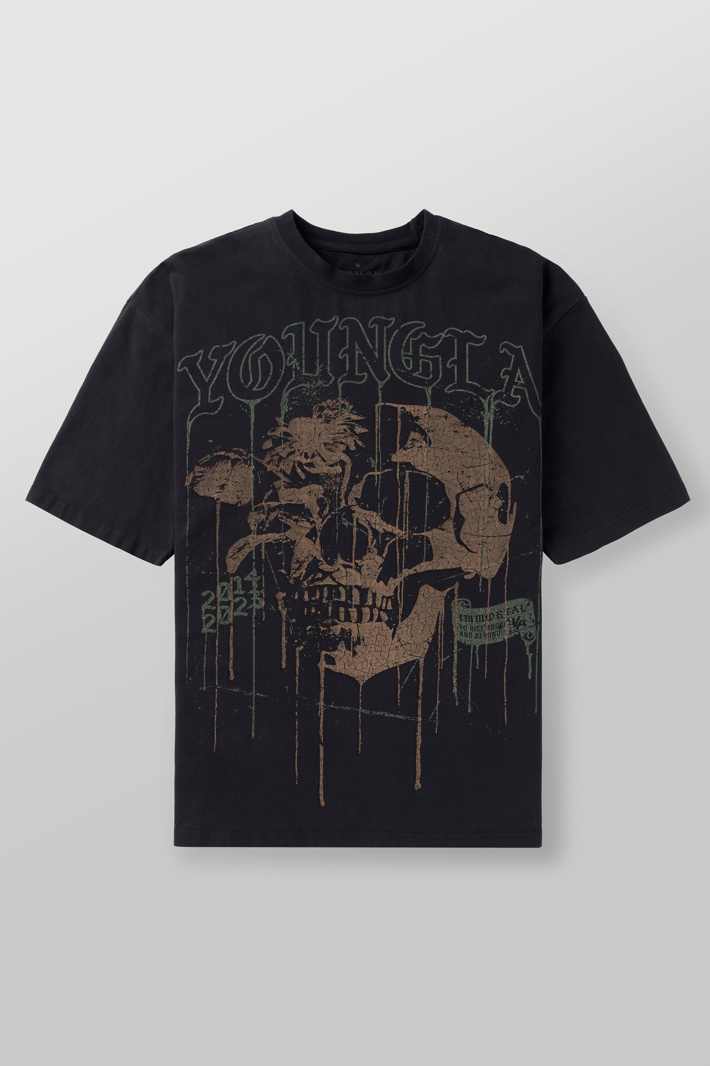 Front view of the floral skull graphic tee in casual setting.