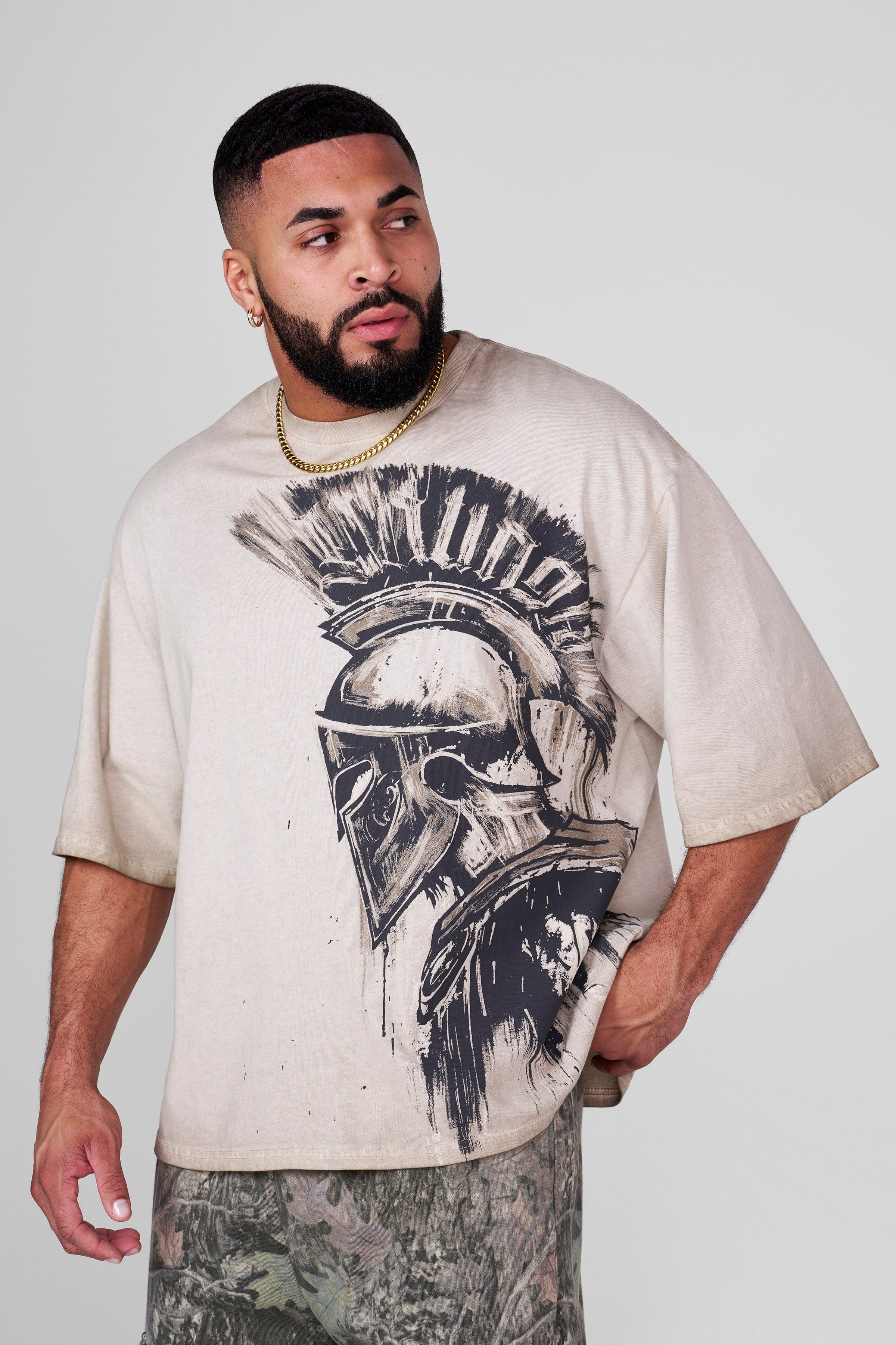 Front view of the Spartan Warrior Oversized Tee with helmet design.