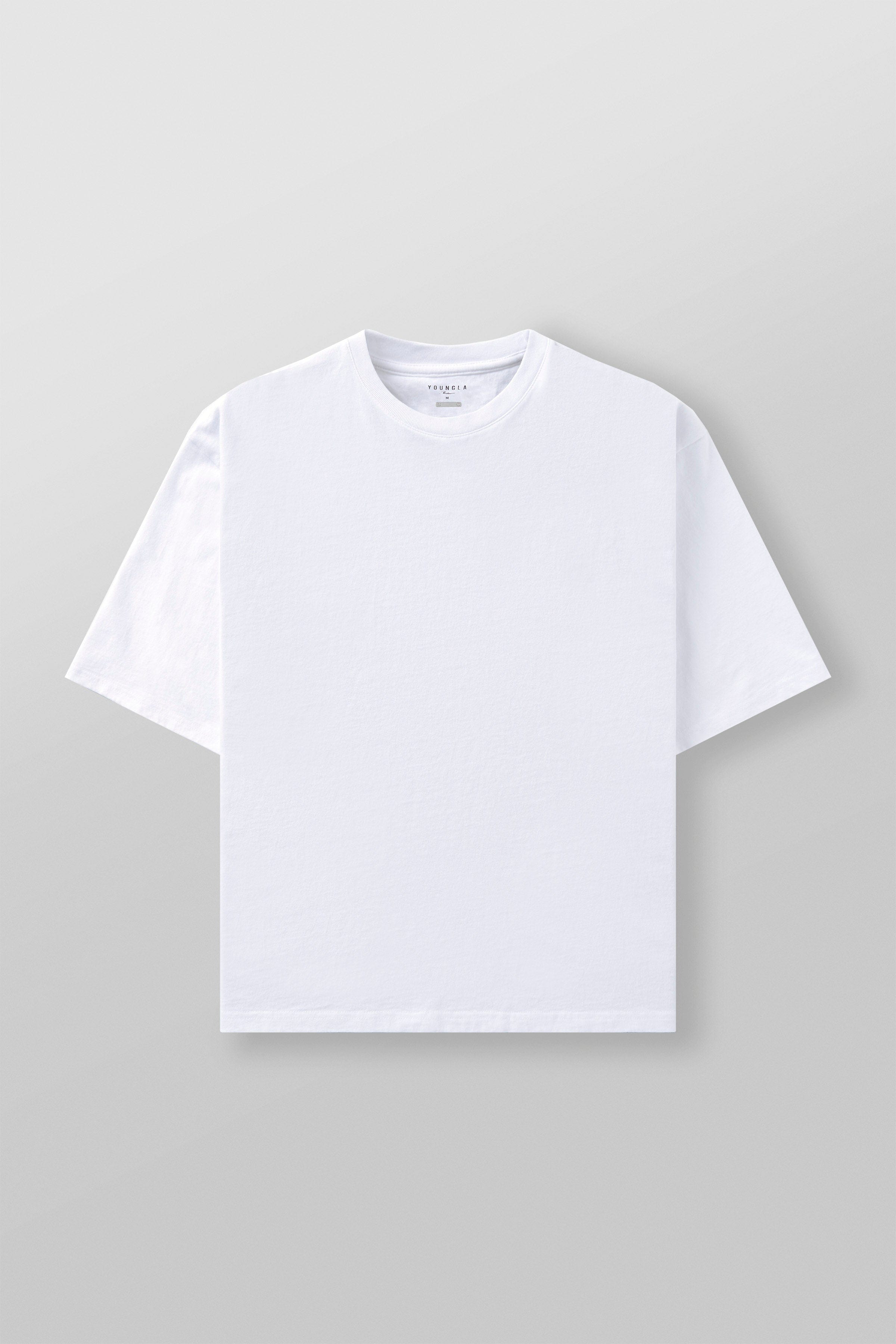 Front view of oversized t shirt men in natural setting showing relaxed fit