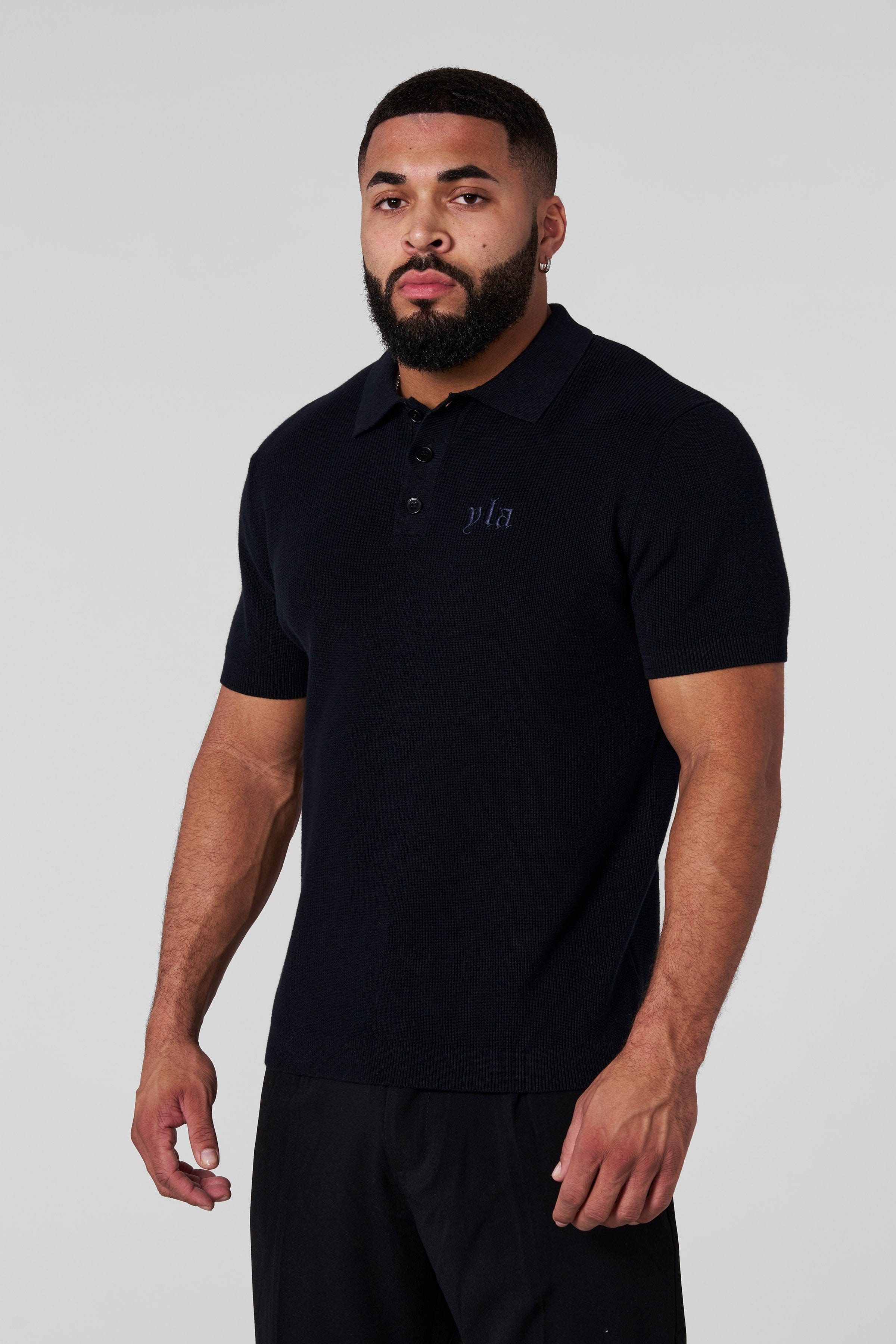Close-up of the soft cotton knit texture of the dressy polo shirt