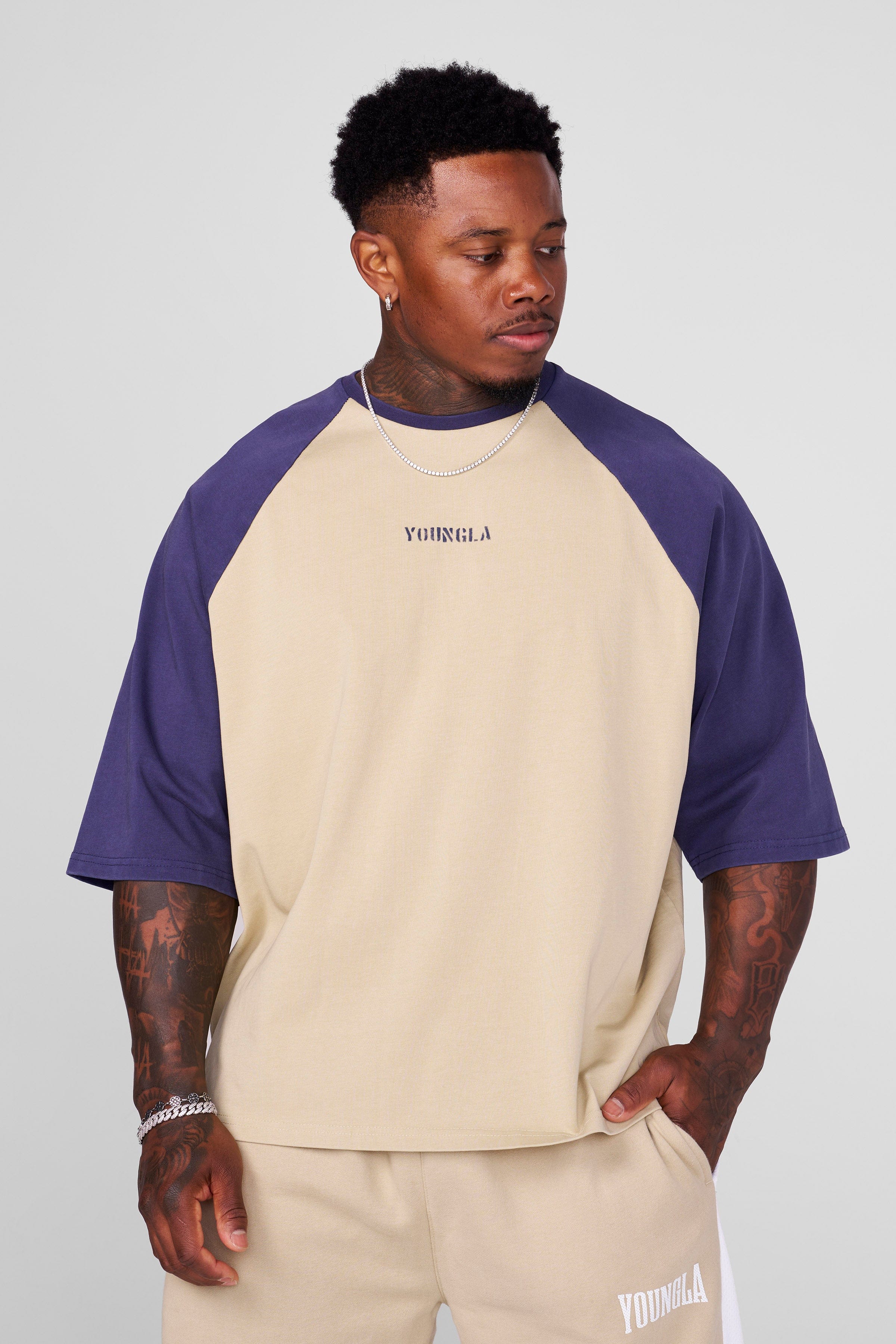 Model wearing the oversized baseball tee, perfect for casual outings.