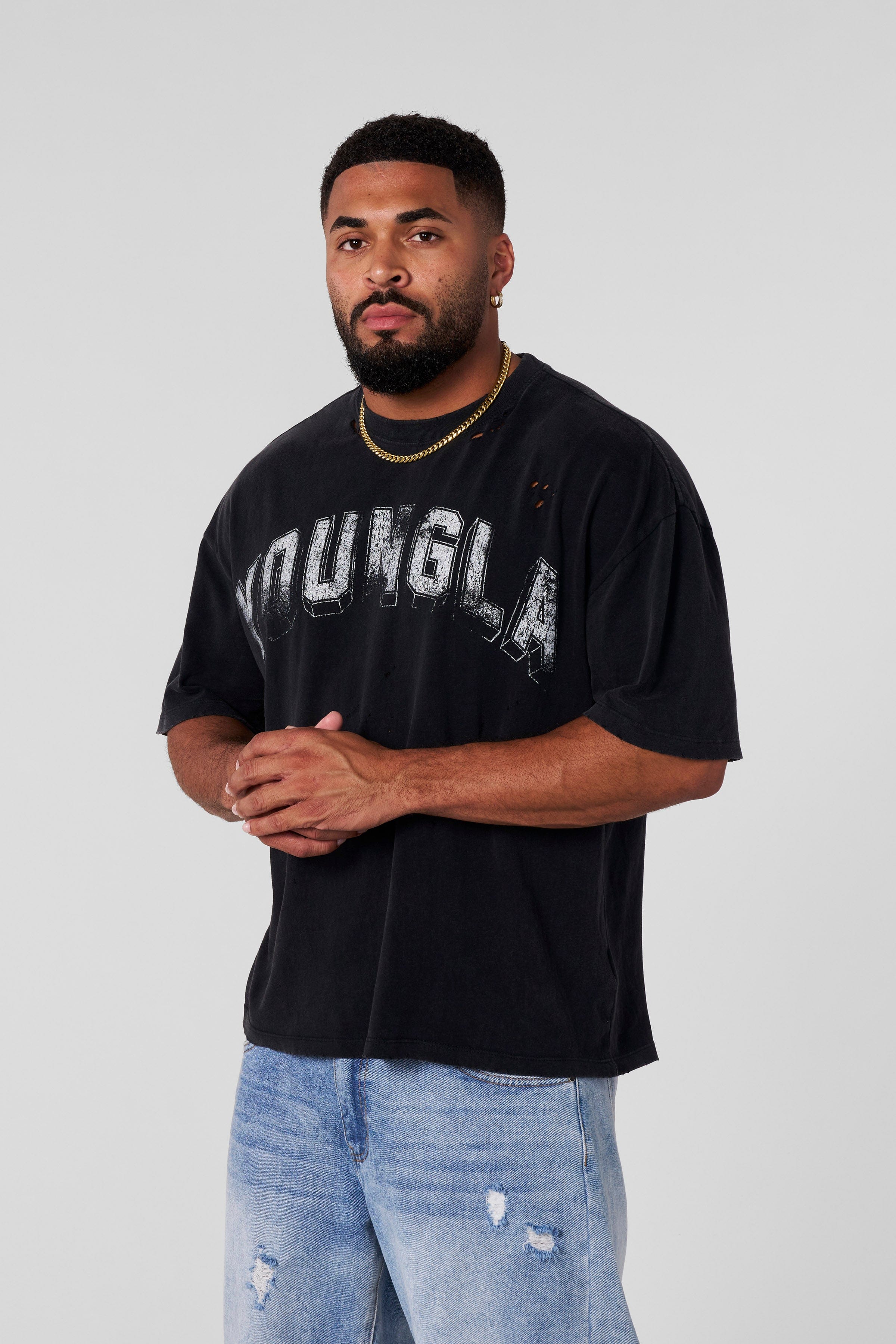 Back detail showing raw streetwear aesthetic