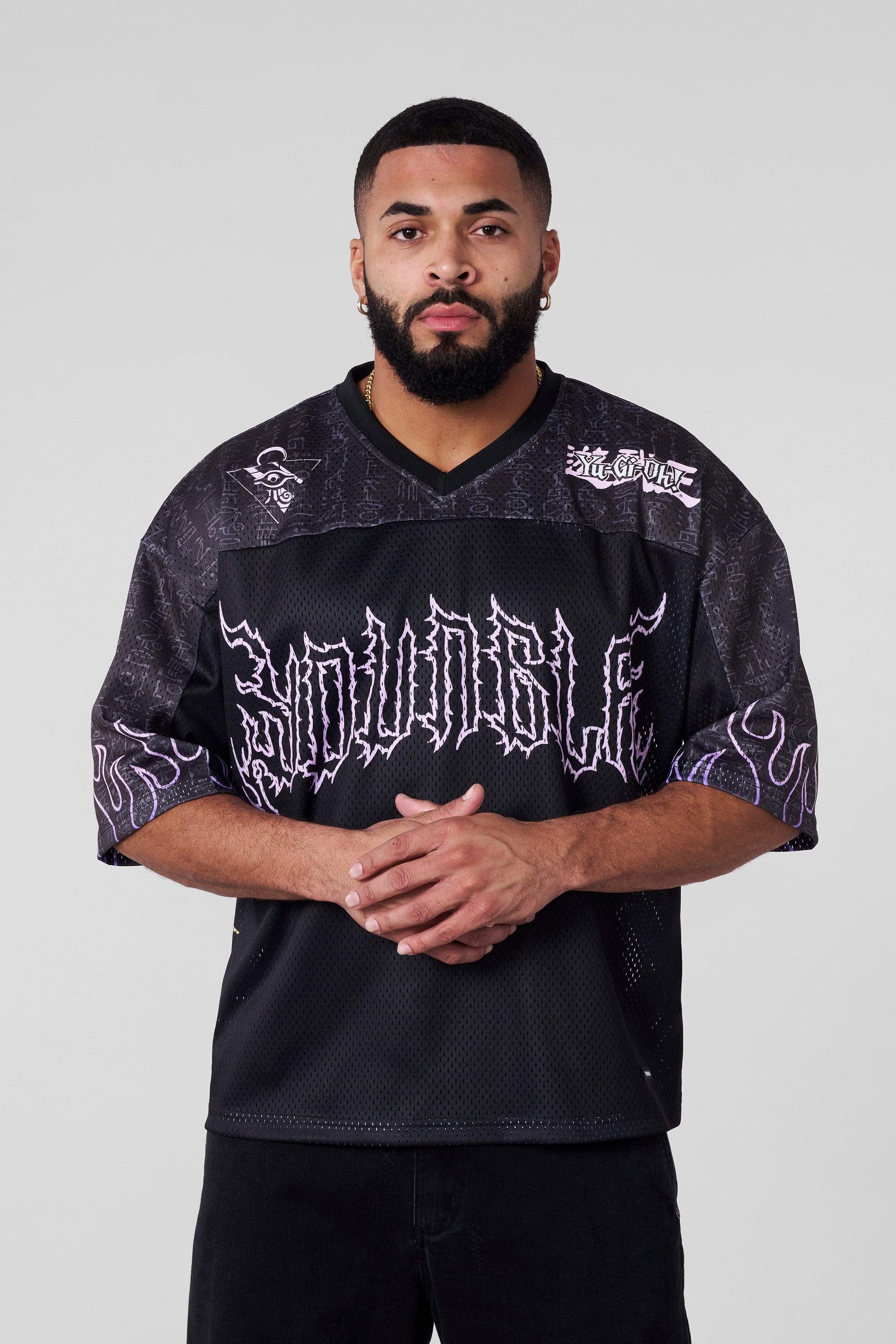 Front view of Yu-Gi-Oh! graphic jersey with character designs.