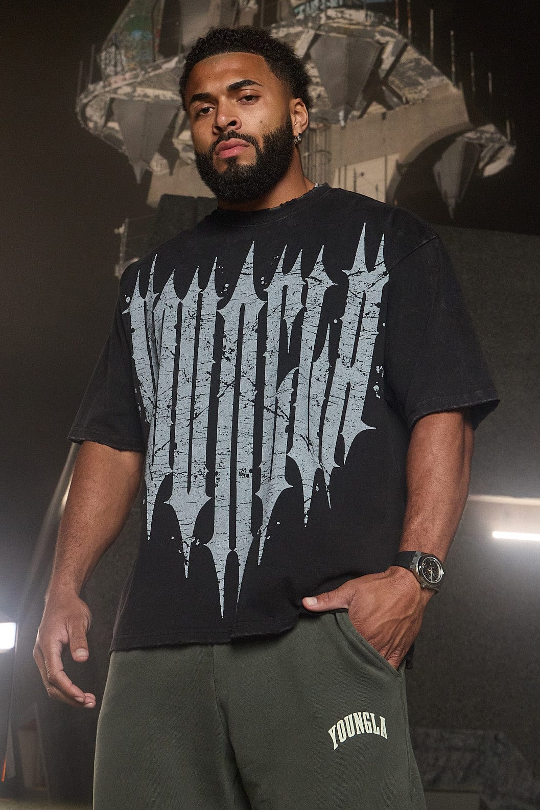 Model wearing an oversized T shirt with vintage graphic design for casual style