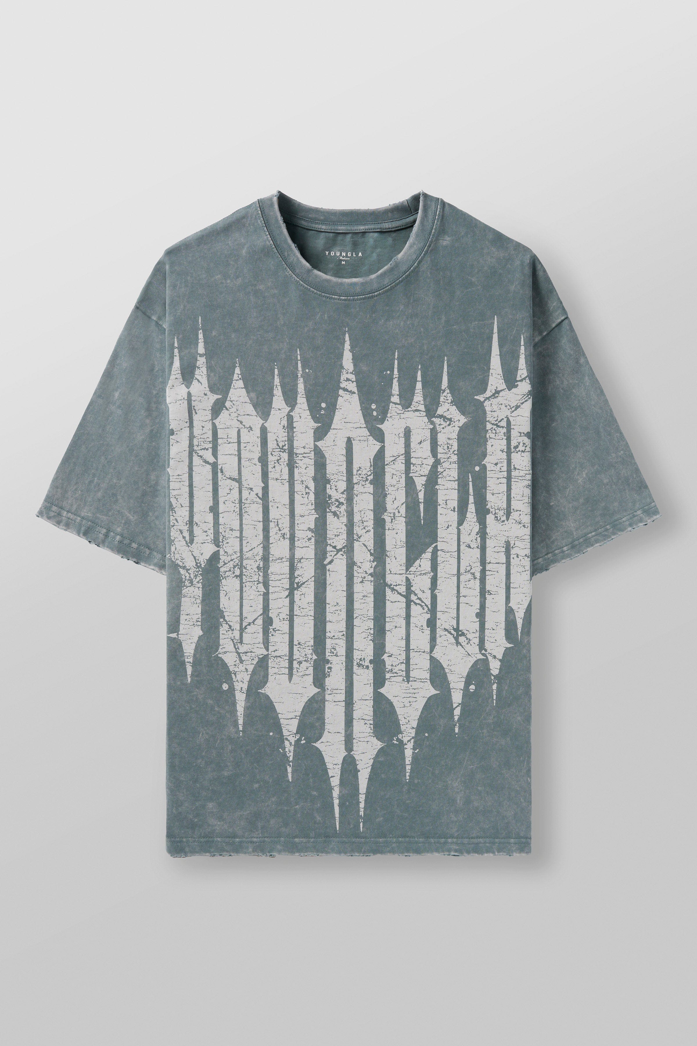 Model wearing an oversized T shirt with vintage graphic design for casual style