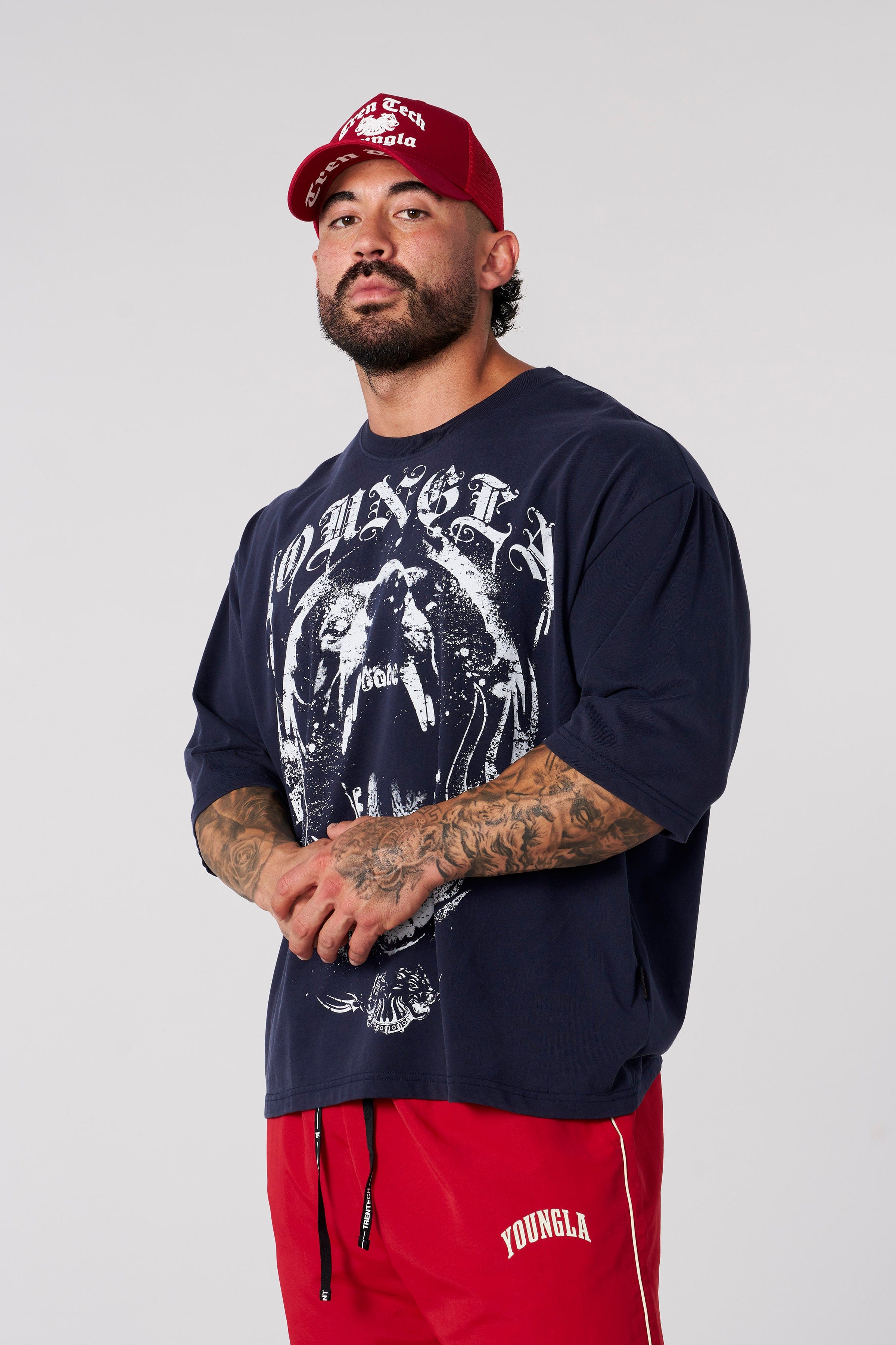 Side angle showing the loose fit of gym t shirts for plus size workout clothes users