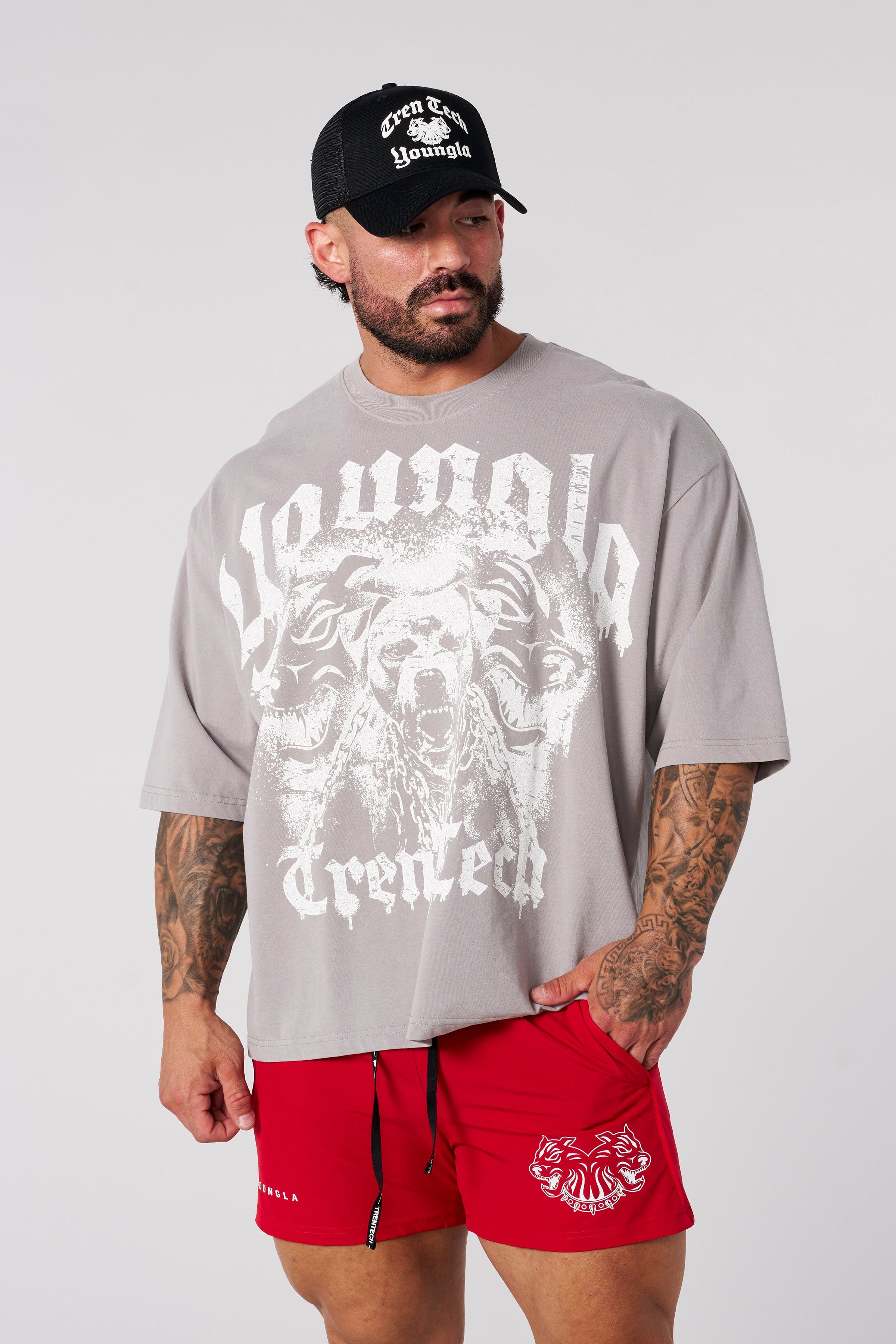 Side angle showing loose fit and stitching details of graphic tees men style