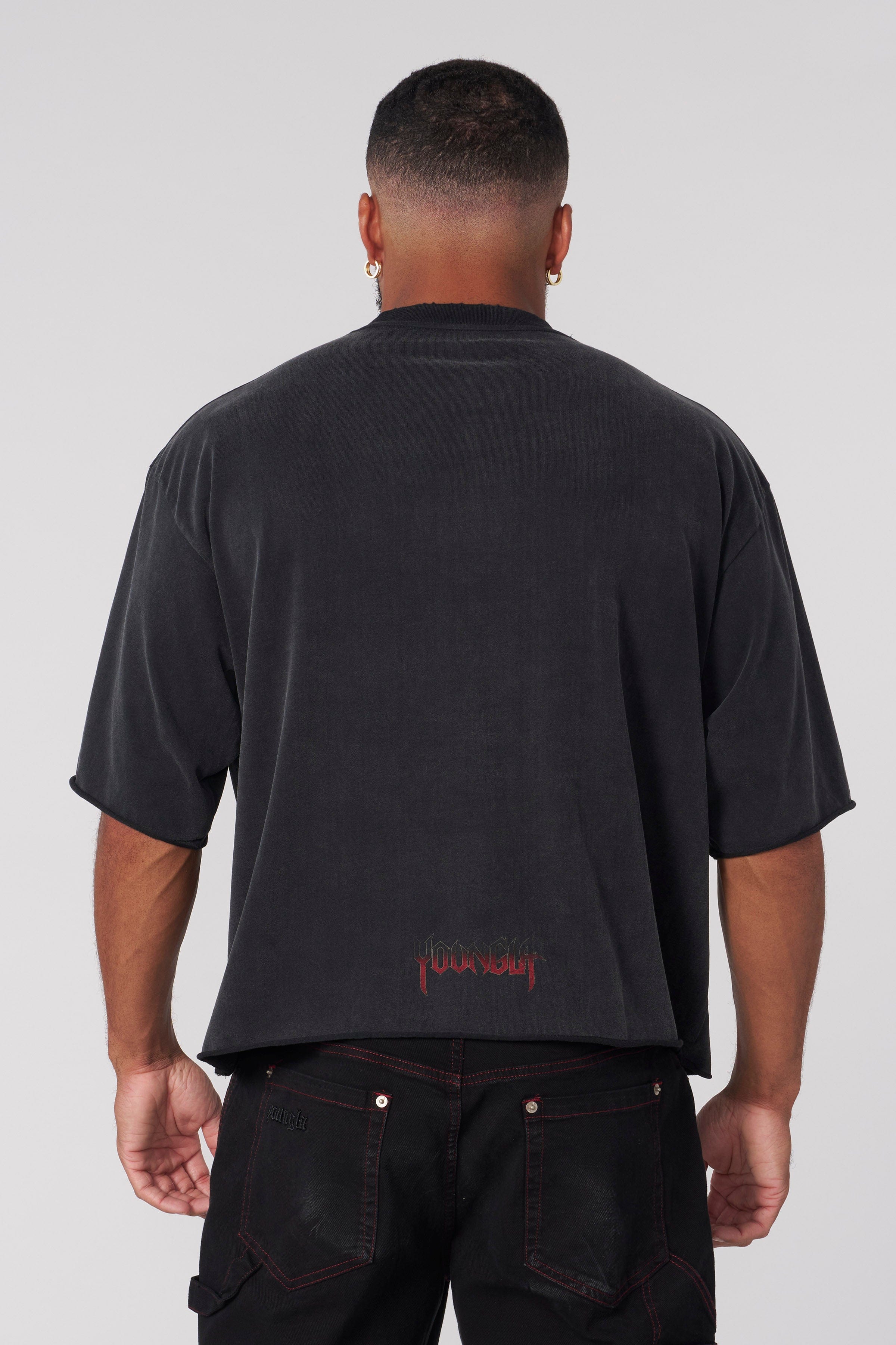 Front view of the Dark Night vintage graphic tee on a model, highlighting the skyline print.