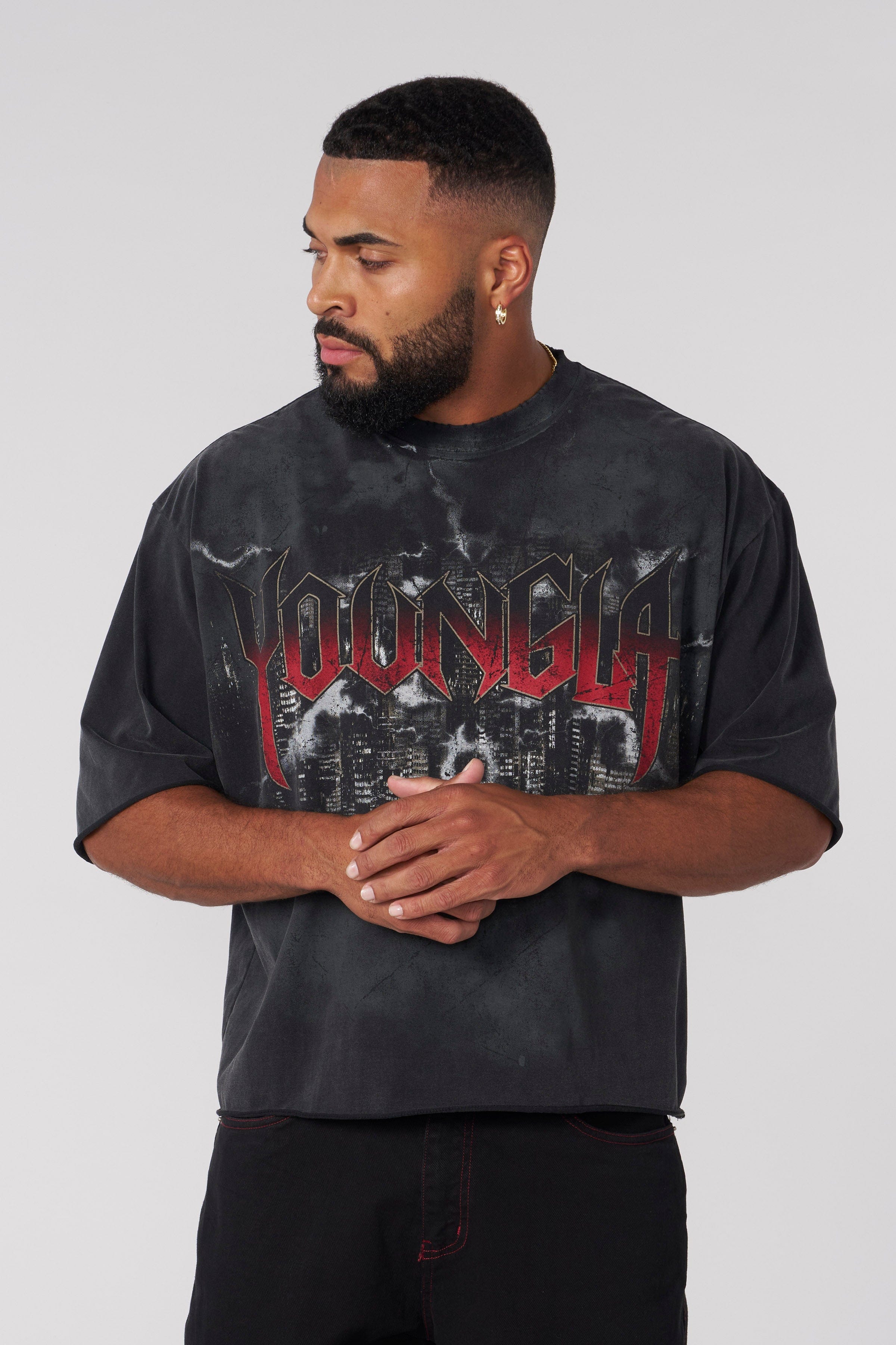 Front view of the Dark Night vintage graphic tee on a model, highlighting the skyline print.