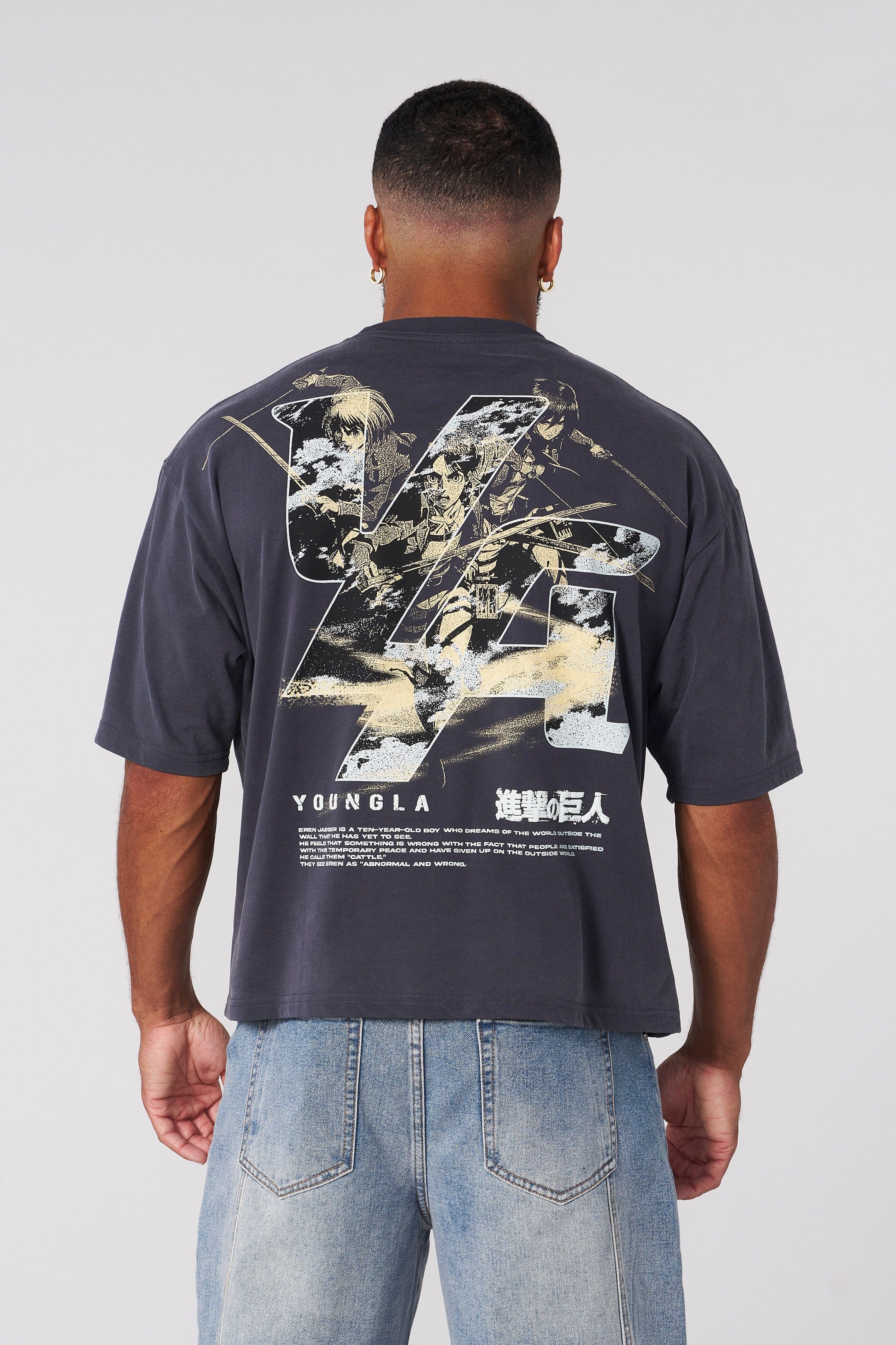 Close-up of the detailed design on the Attack on Titan cropped tee.