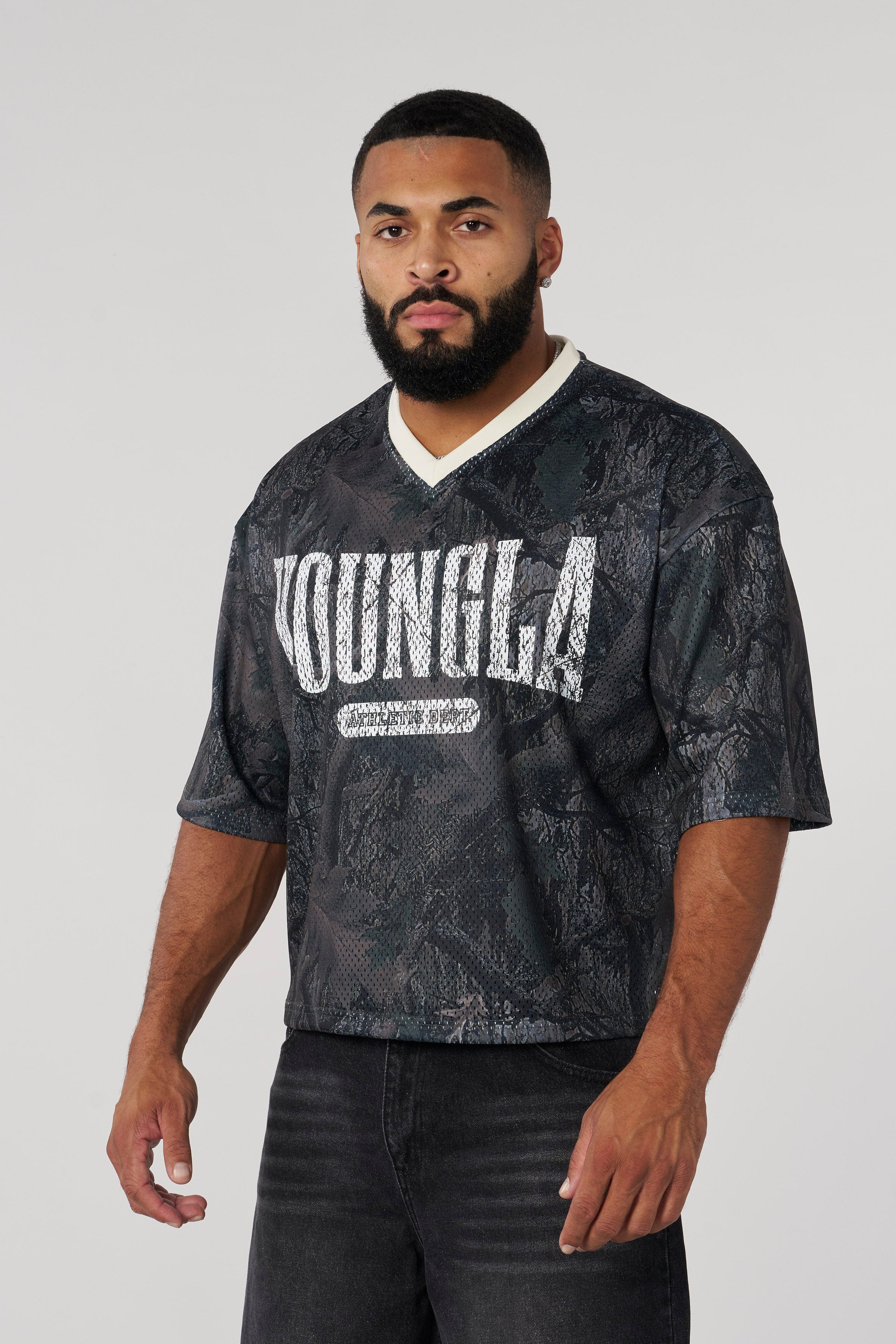 Model wearing a cropped jersey crop shirt during activewear session