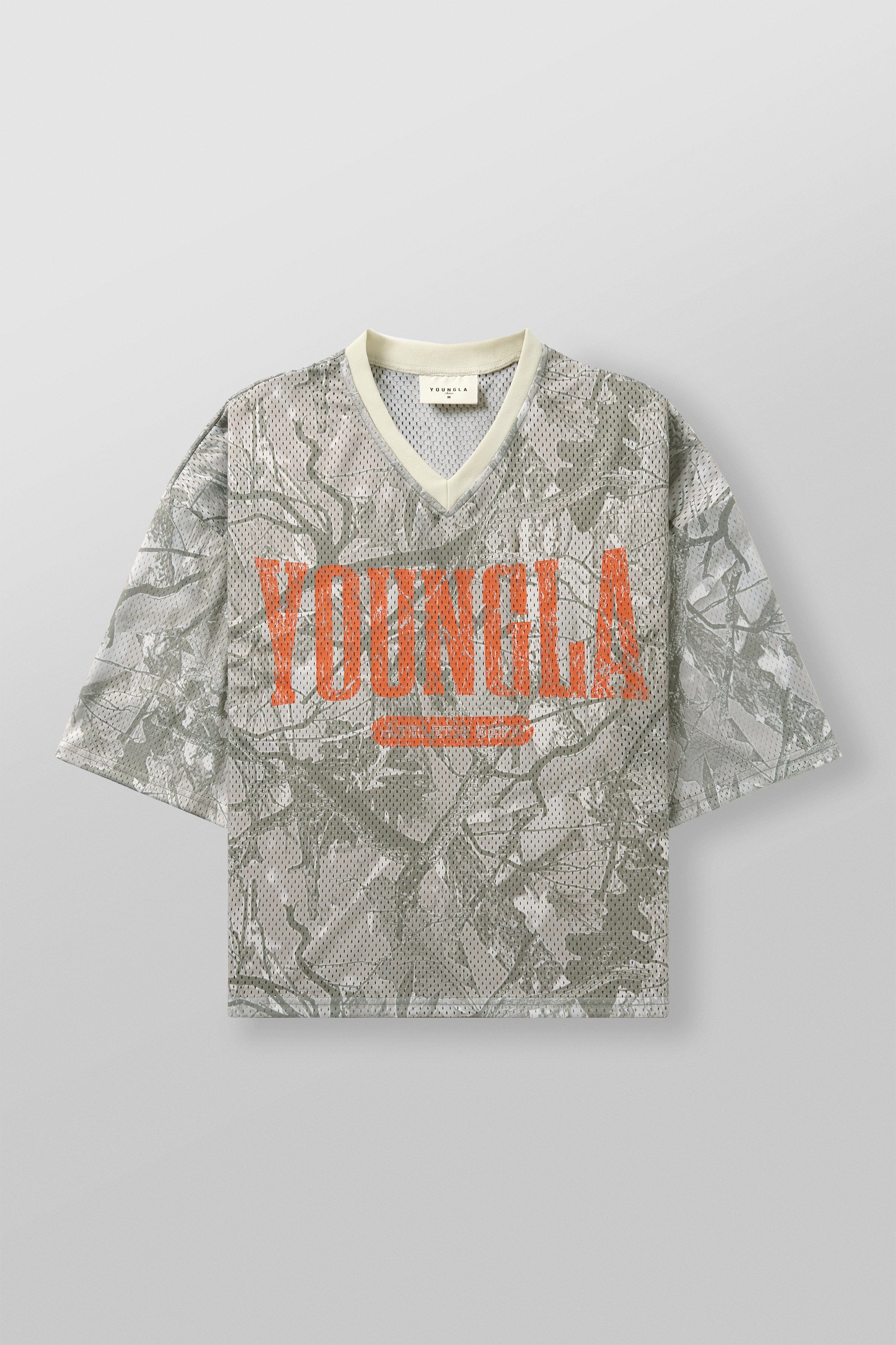 Front view of varsity football cropped jersey with ribbed V-neck and distressed logo