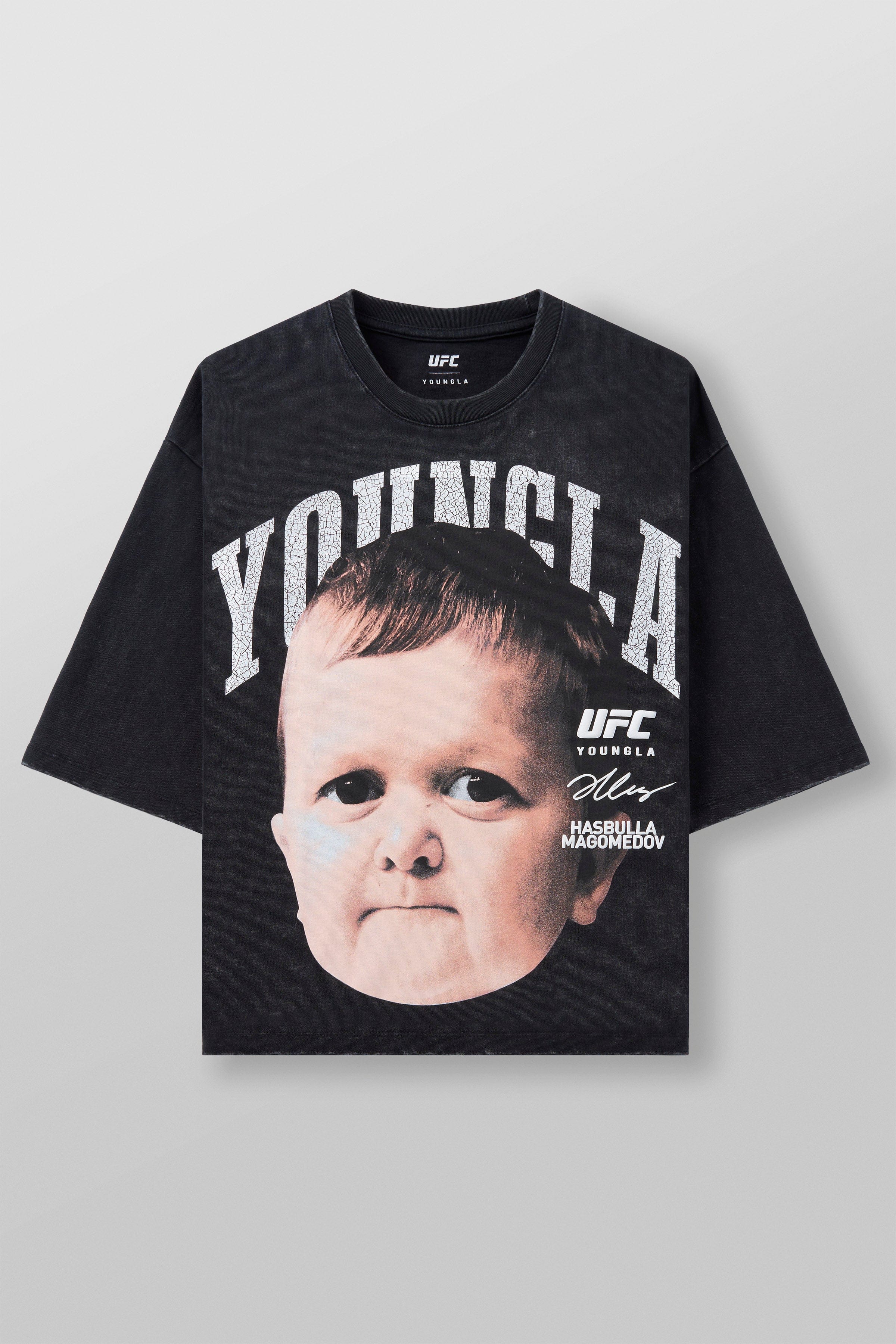 Front angle of fight club tee with bold fighter face print, worn casually