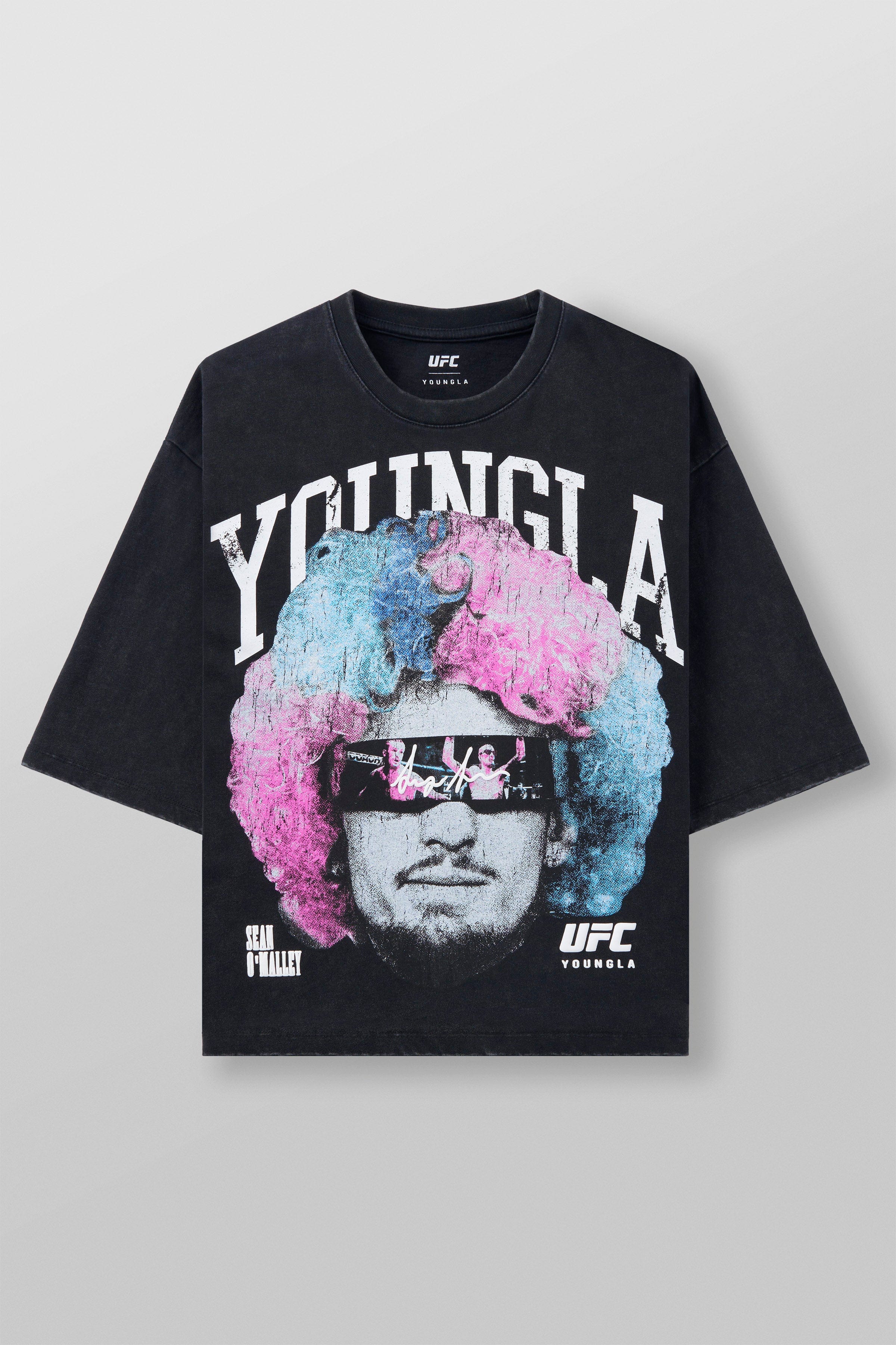 Side view of MMA apparel showing relaxed cropped fit and fabric texture