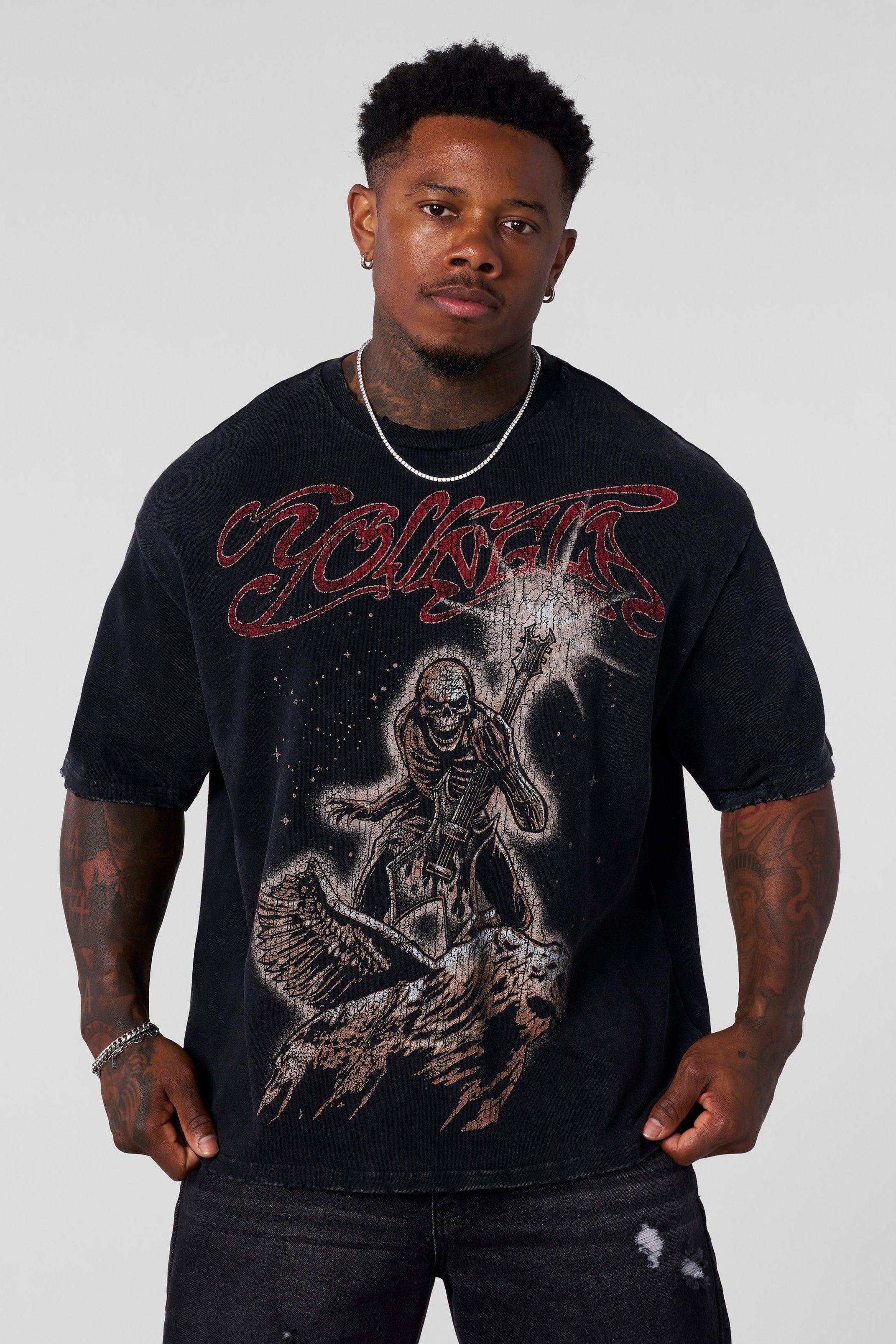 Model wearing a vintage rock tee with relaxed fit and classic design