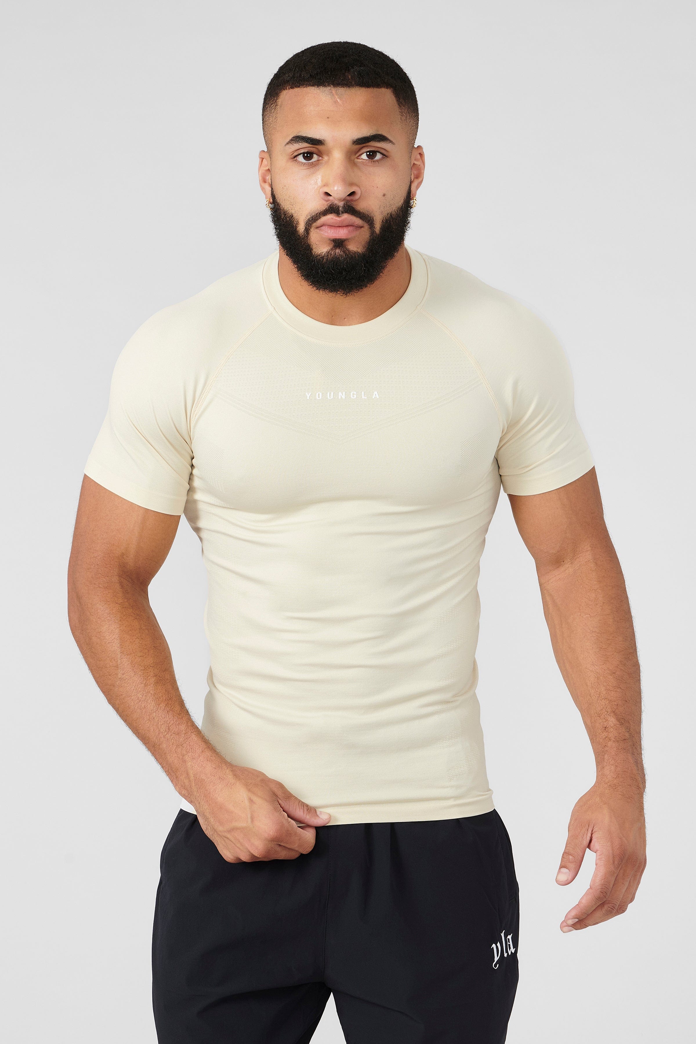Close-up of fabric texture of SuperVillain fitness compression tees.