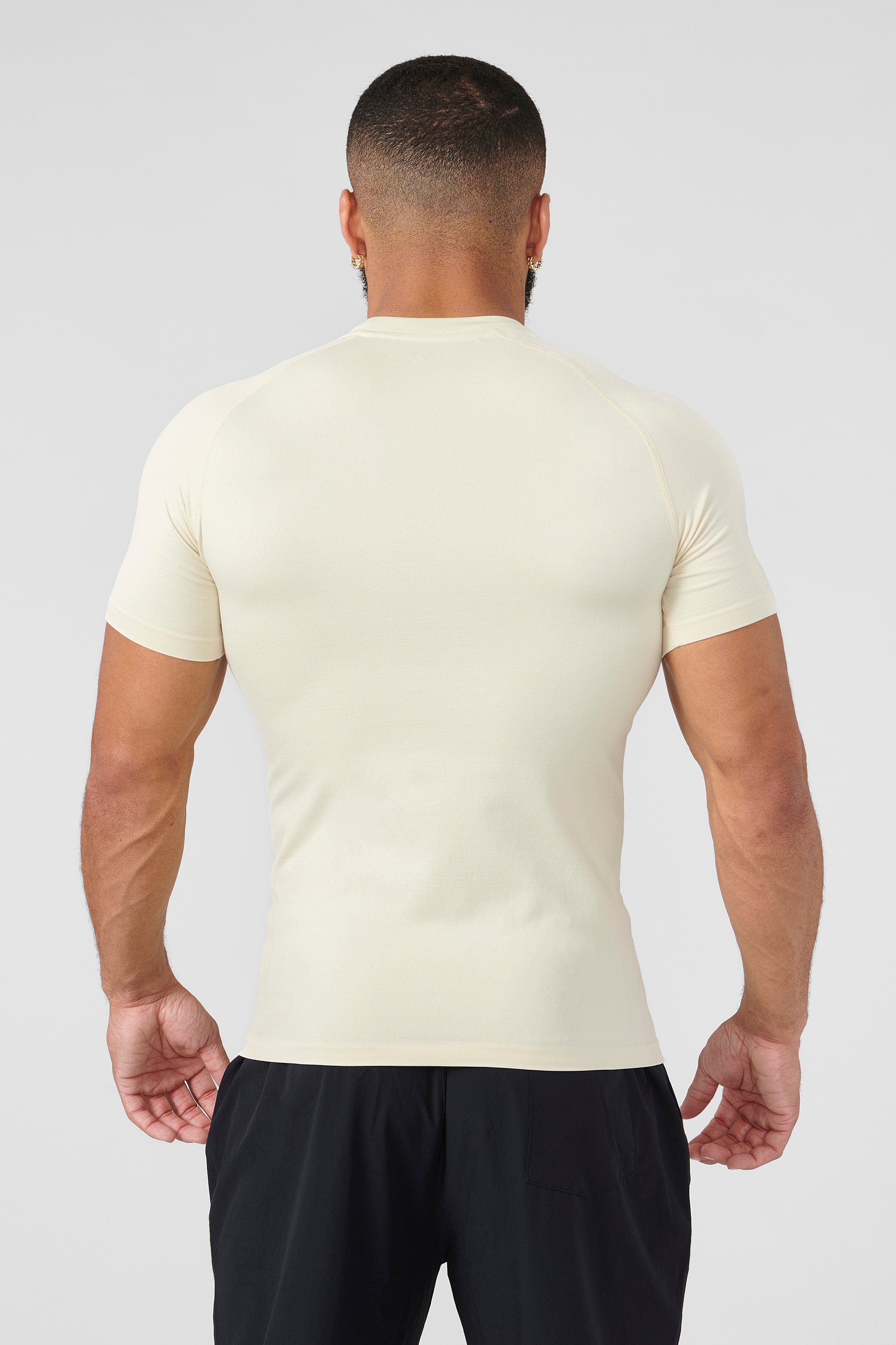 Close-up of fabric texture of SuperVillain fitness compression tees.