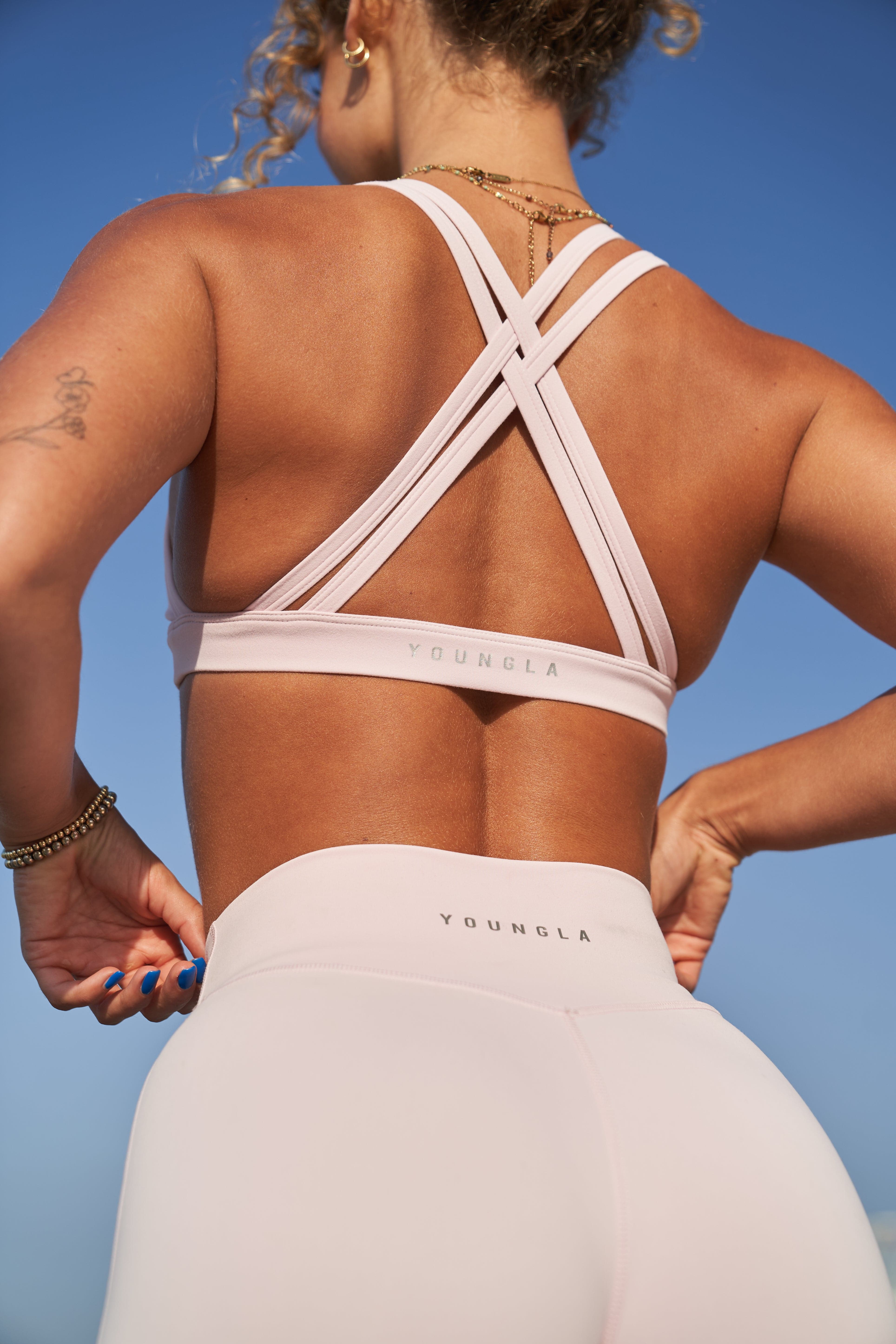 Front view of the Effortless Sports Bra showcasing its double cross back design.