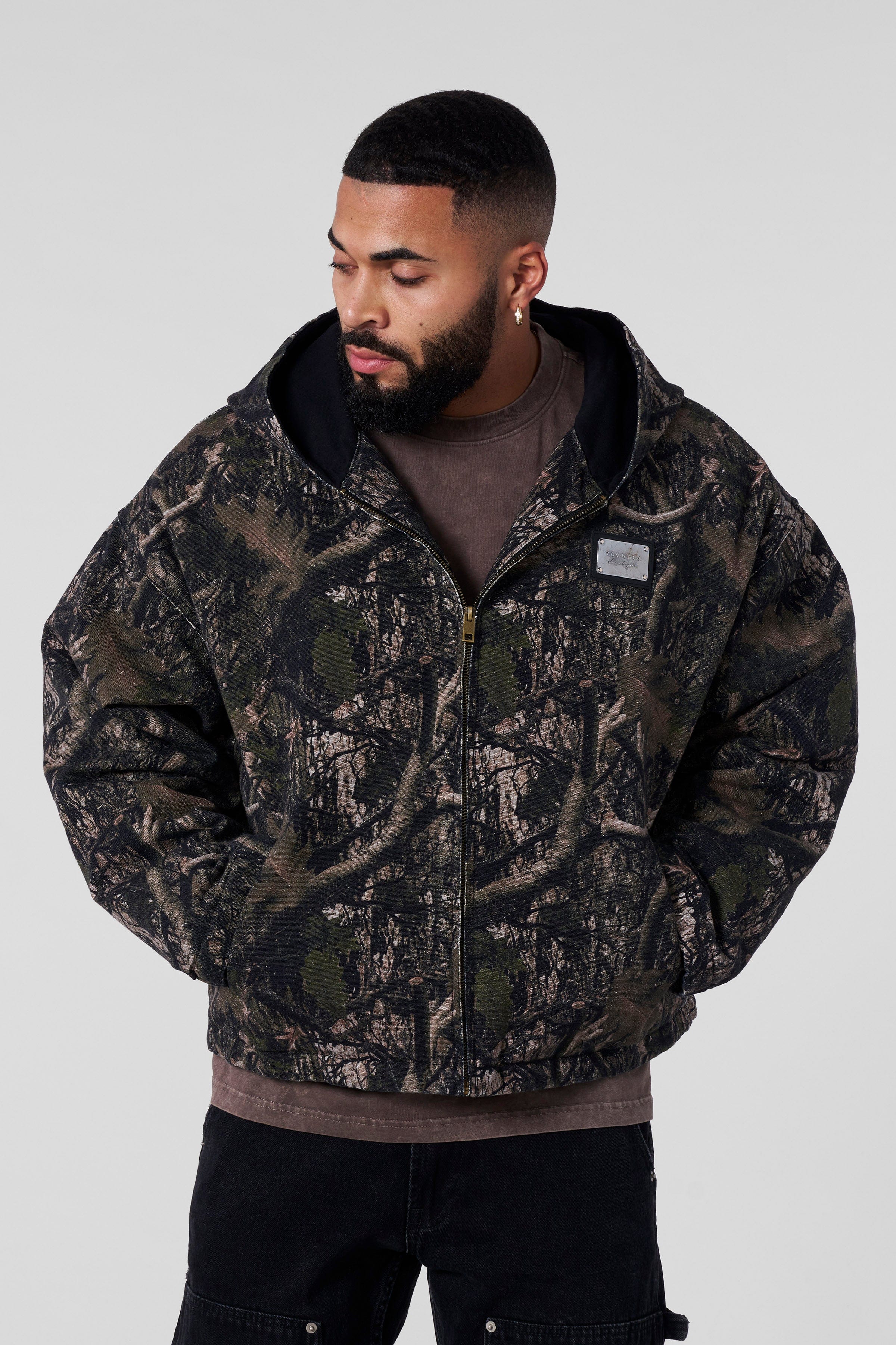 Jacket hanging on a hook with soft lighting highlighting its color