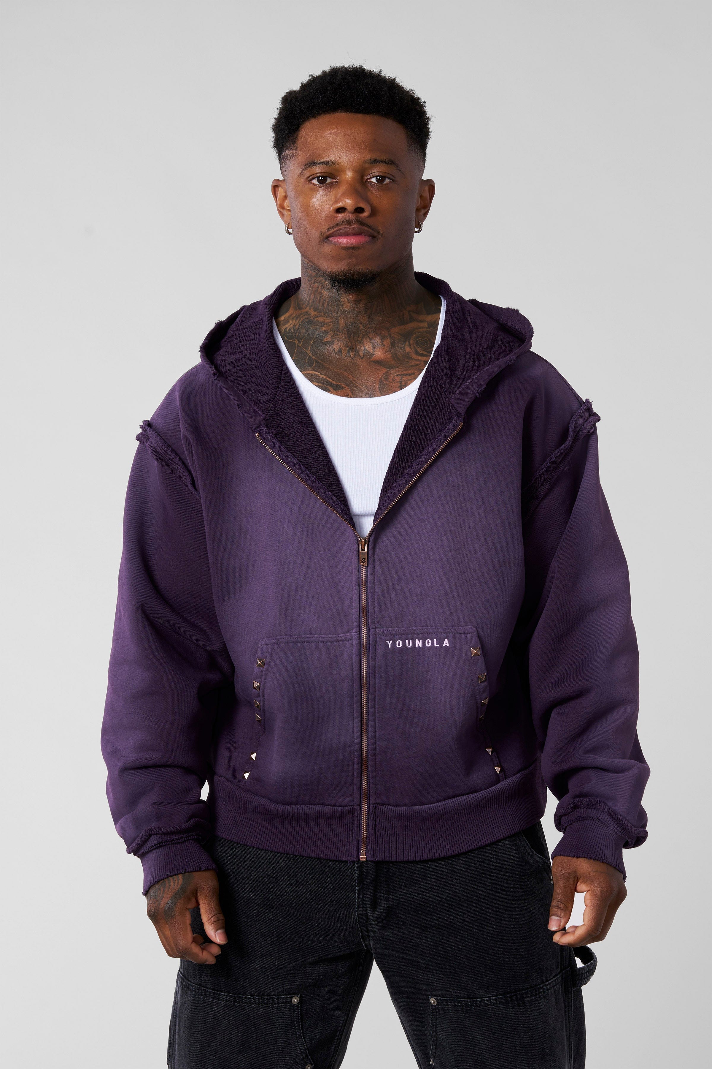 Front view of the vintage-washed, heavy French Terry hoodie in streetwear style
