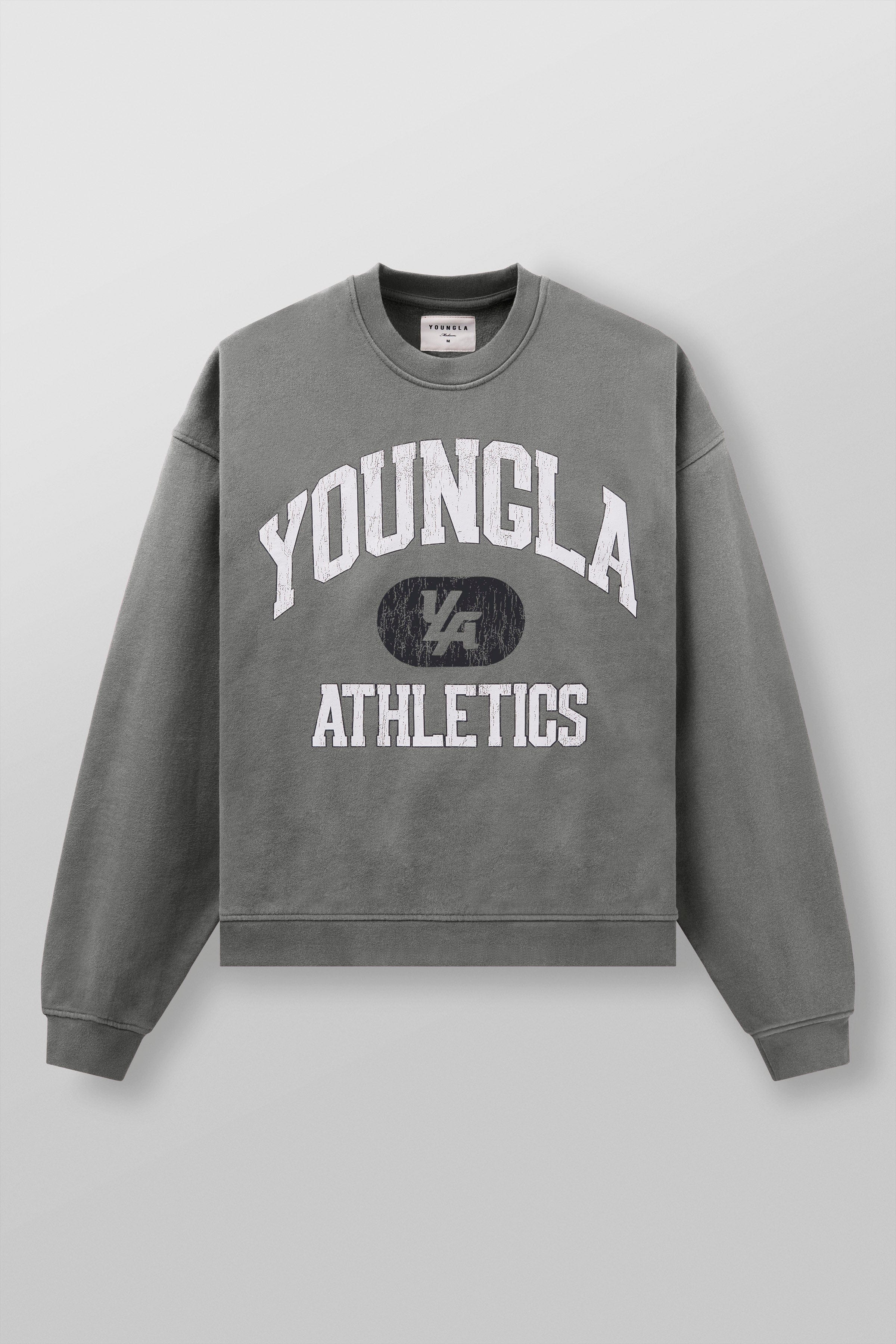 Back view of vintage sweatshirt with relaxed oversized clothing fit worn on city sidewalk