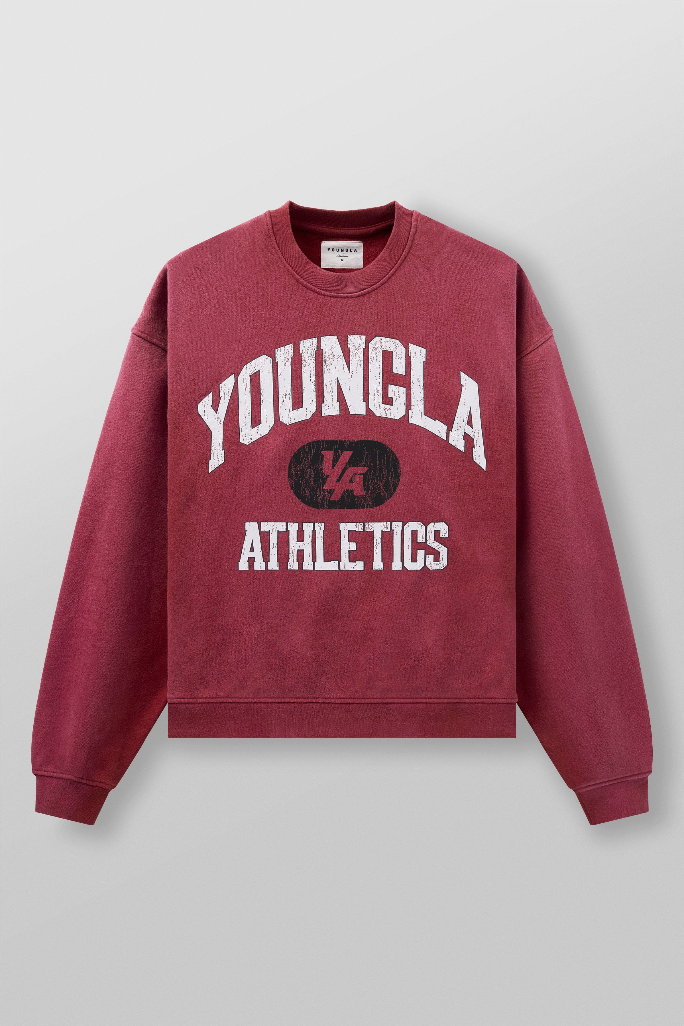 Close-up of camo crewneck neckline and graphic detailing on heavyweight fabric