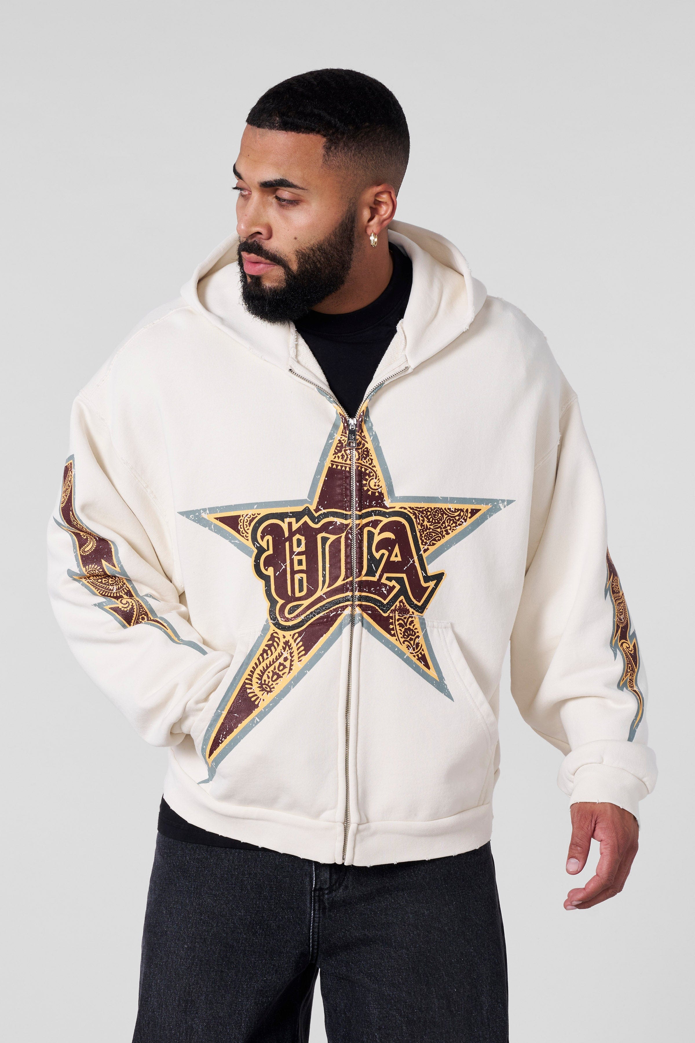 Side view of the oversized hoodie, highlighting its comfortable fit and premium fabric.