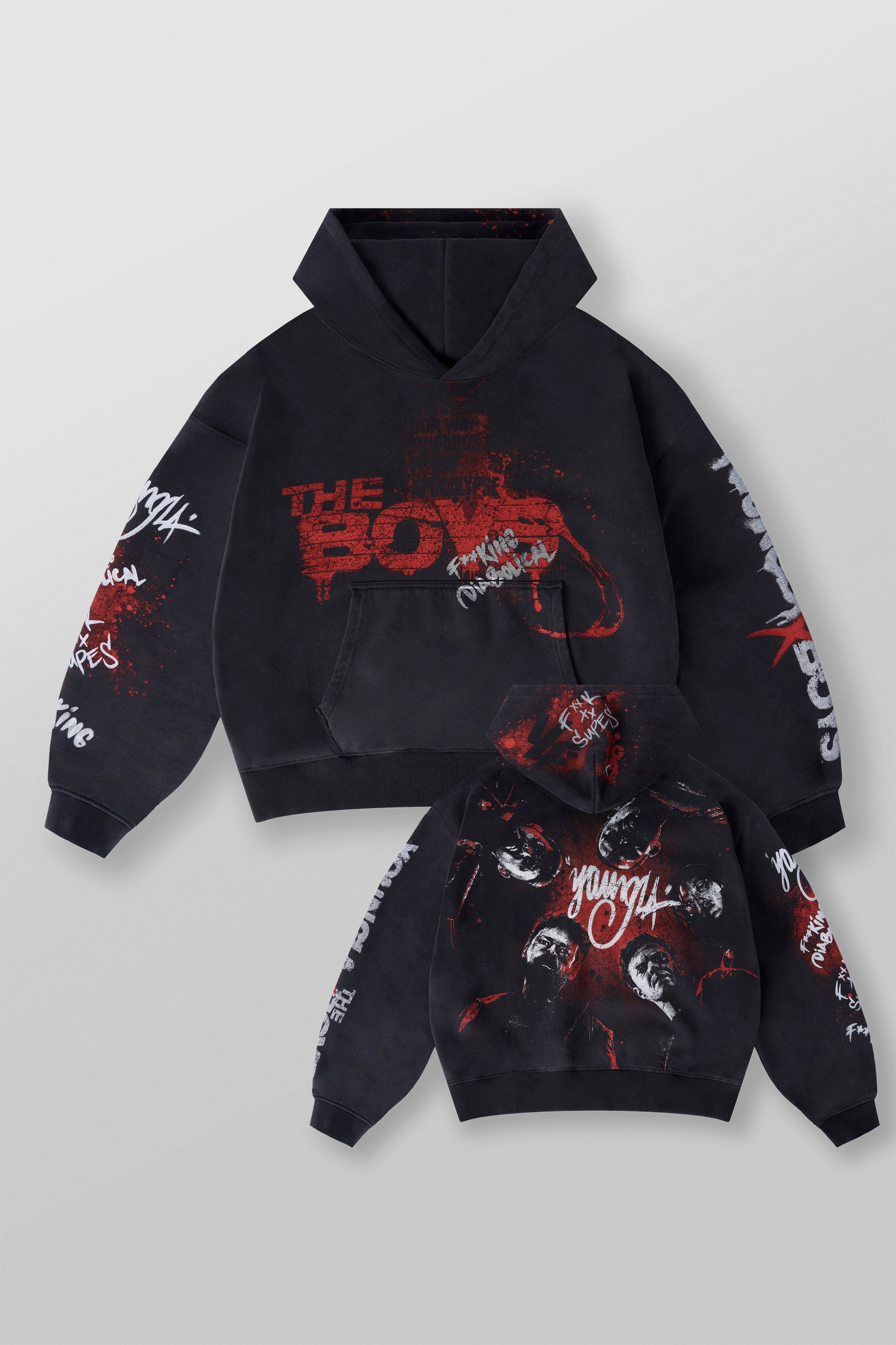 Back view of the mens graphic hoodie in a casual street setting.