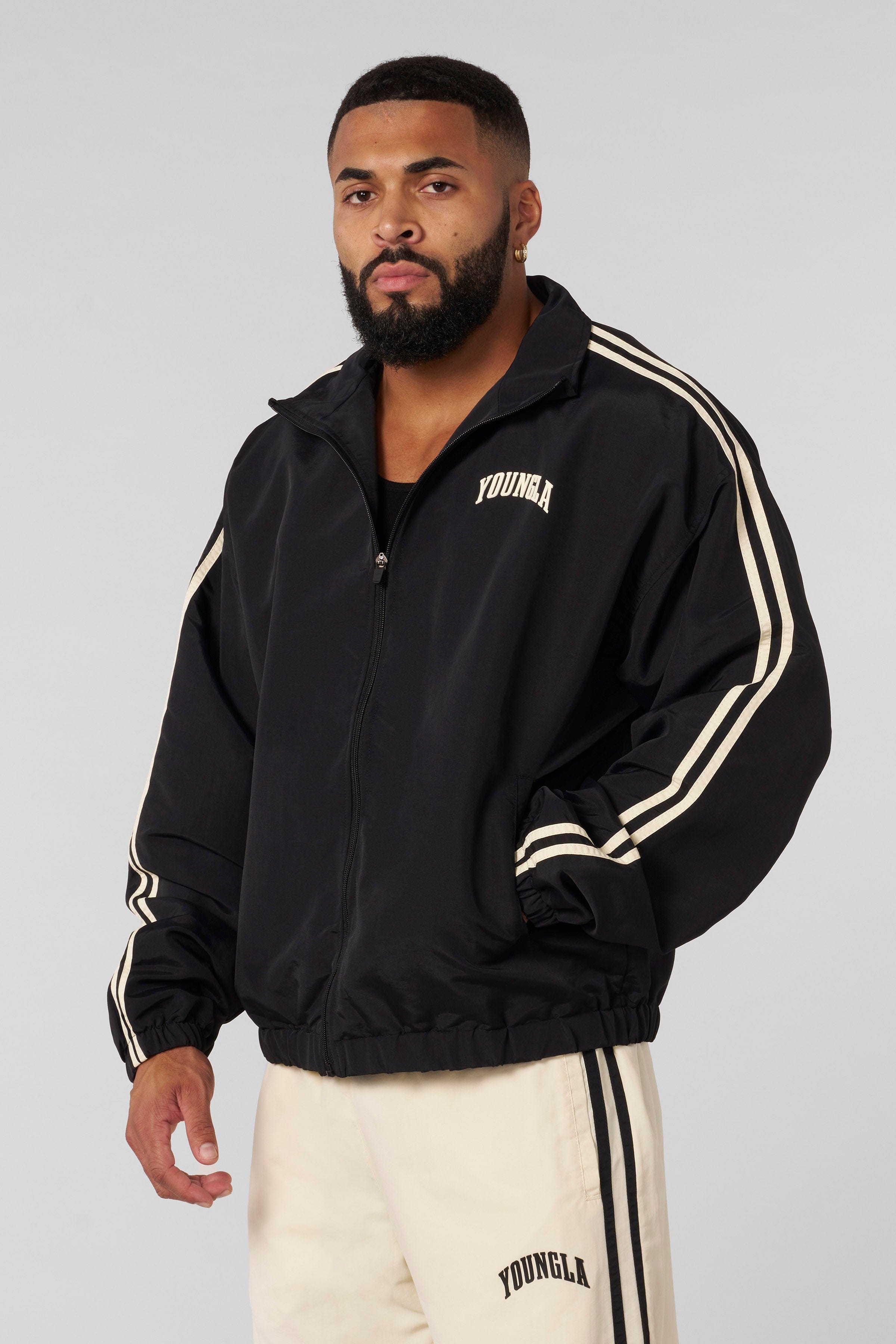 Model wearing the lululemon zip up jacket during a workout session.