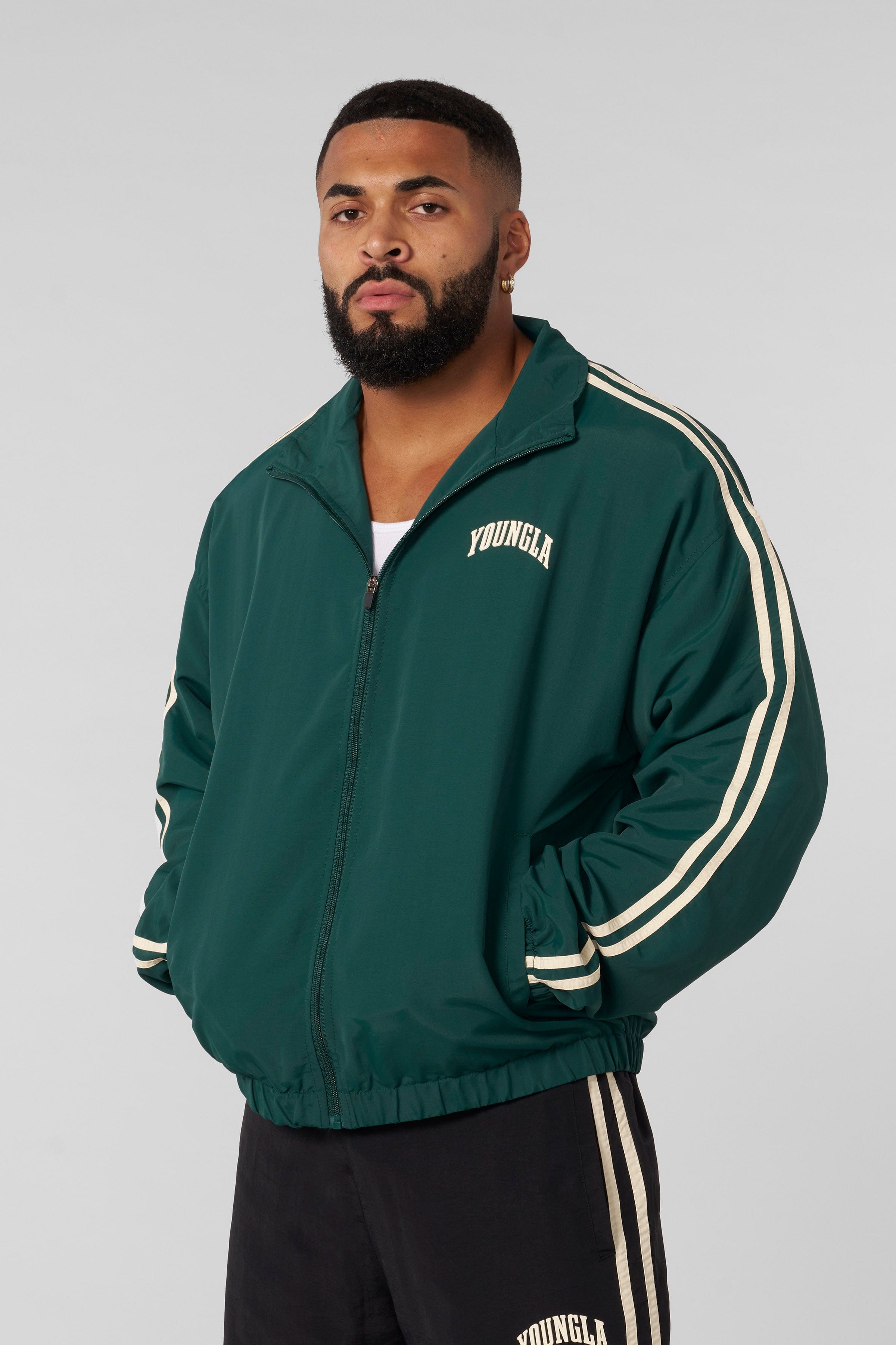Front view of the athletic zip-up jacket for men, showcasing sporty design.