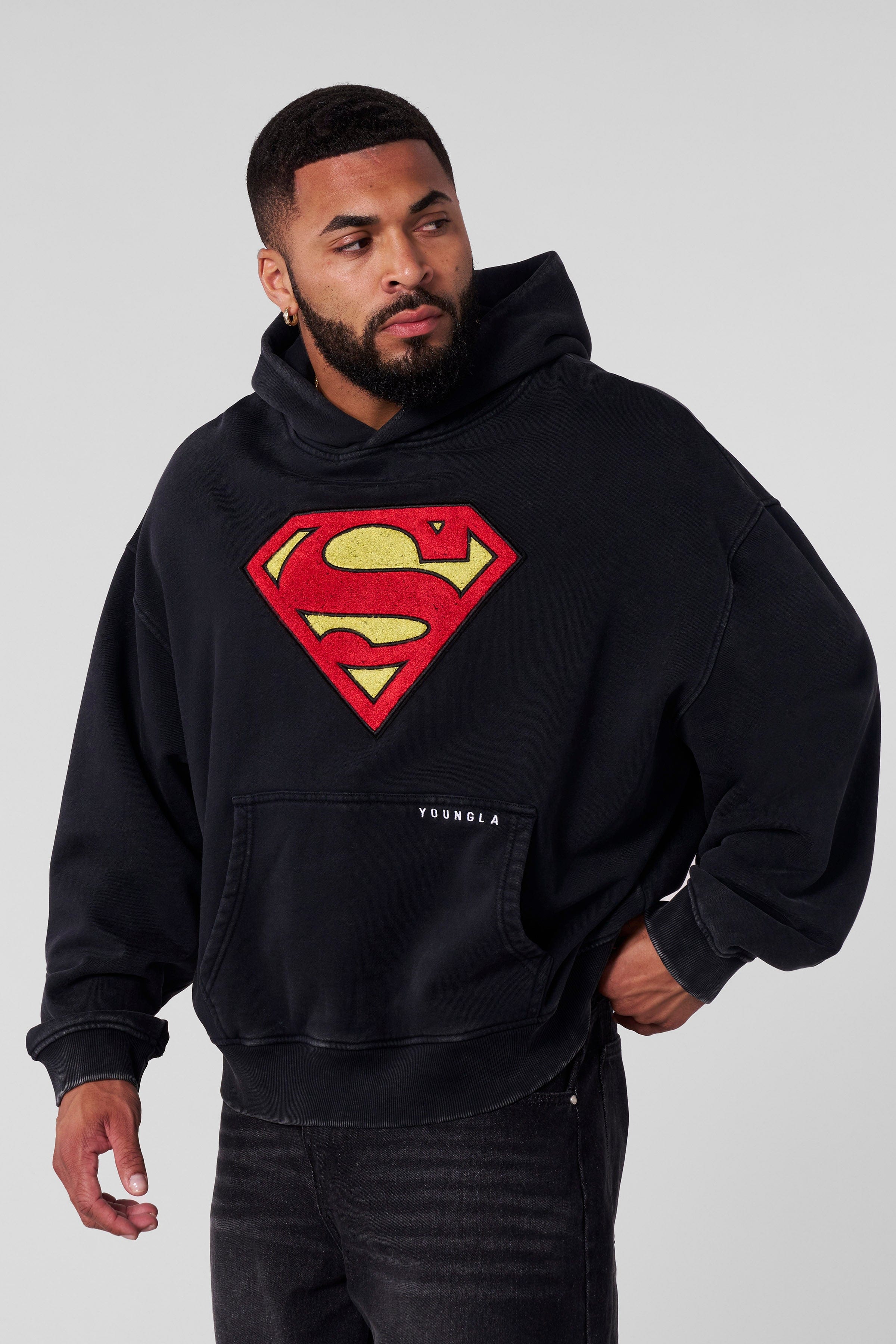 Front view of the Superman Legacy oversized hoodie with logo.