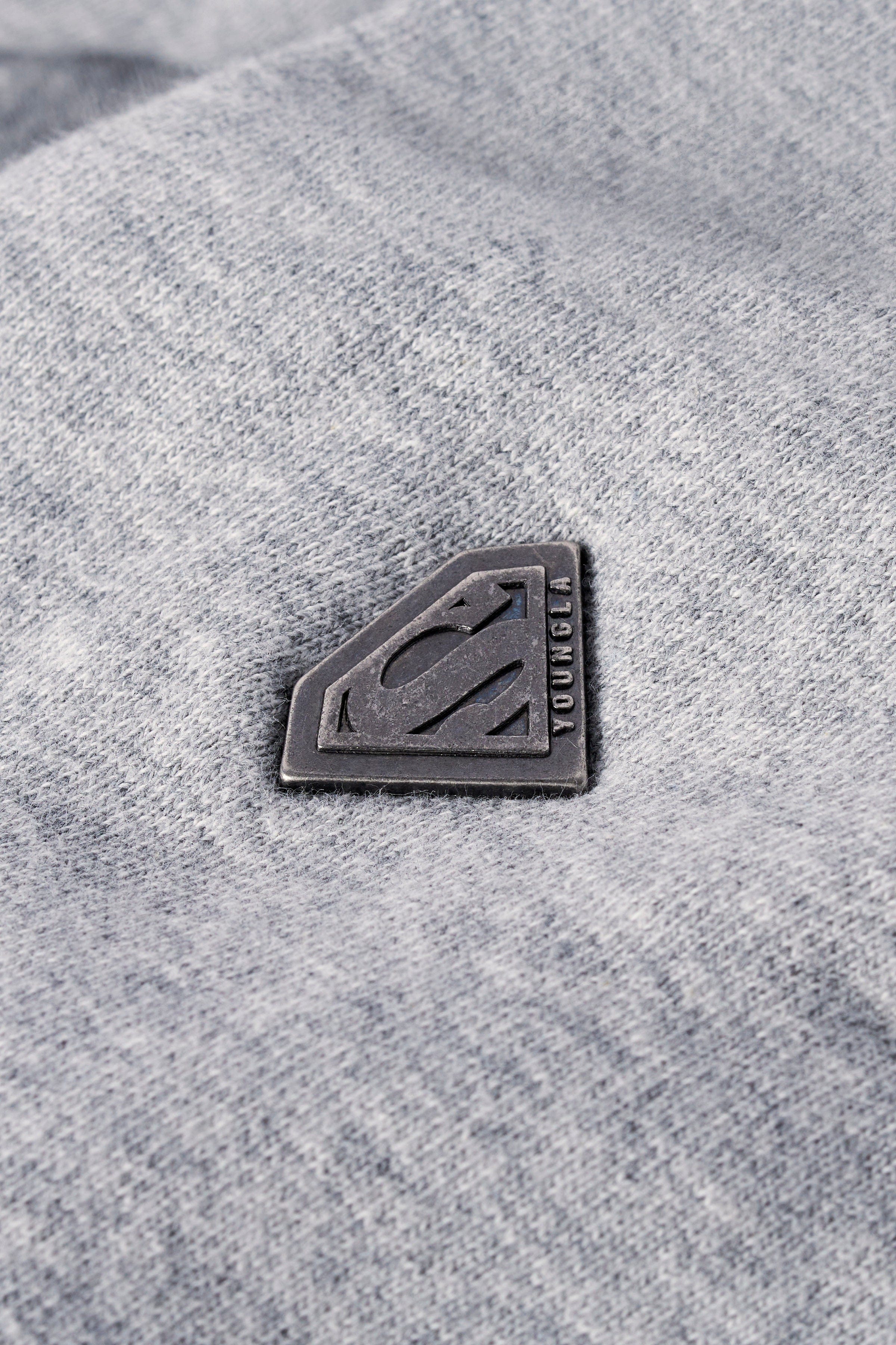 Front view of the Superman Legacy oversized hoodie with logo.