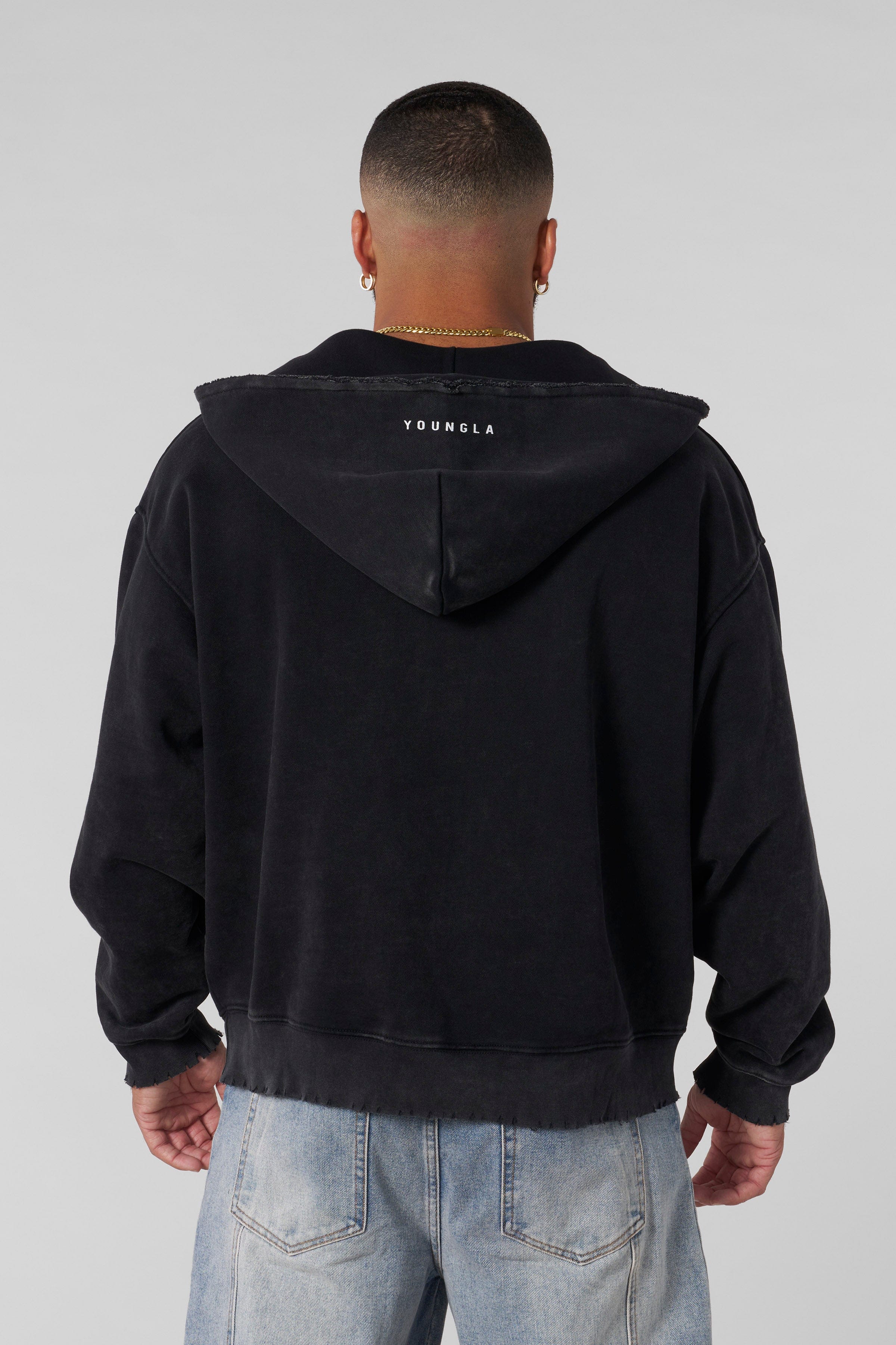 Front view of the distressed anarchy hoodie with bold logo and rugged design