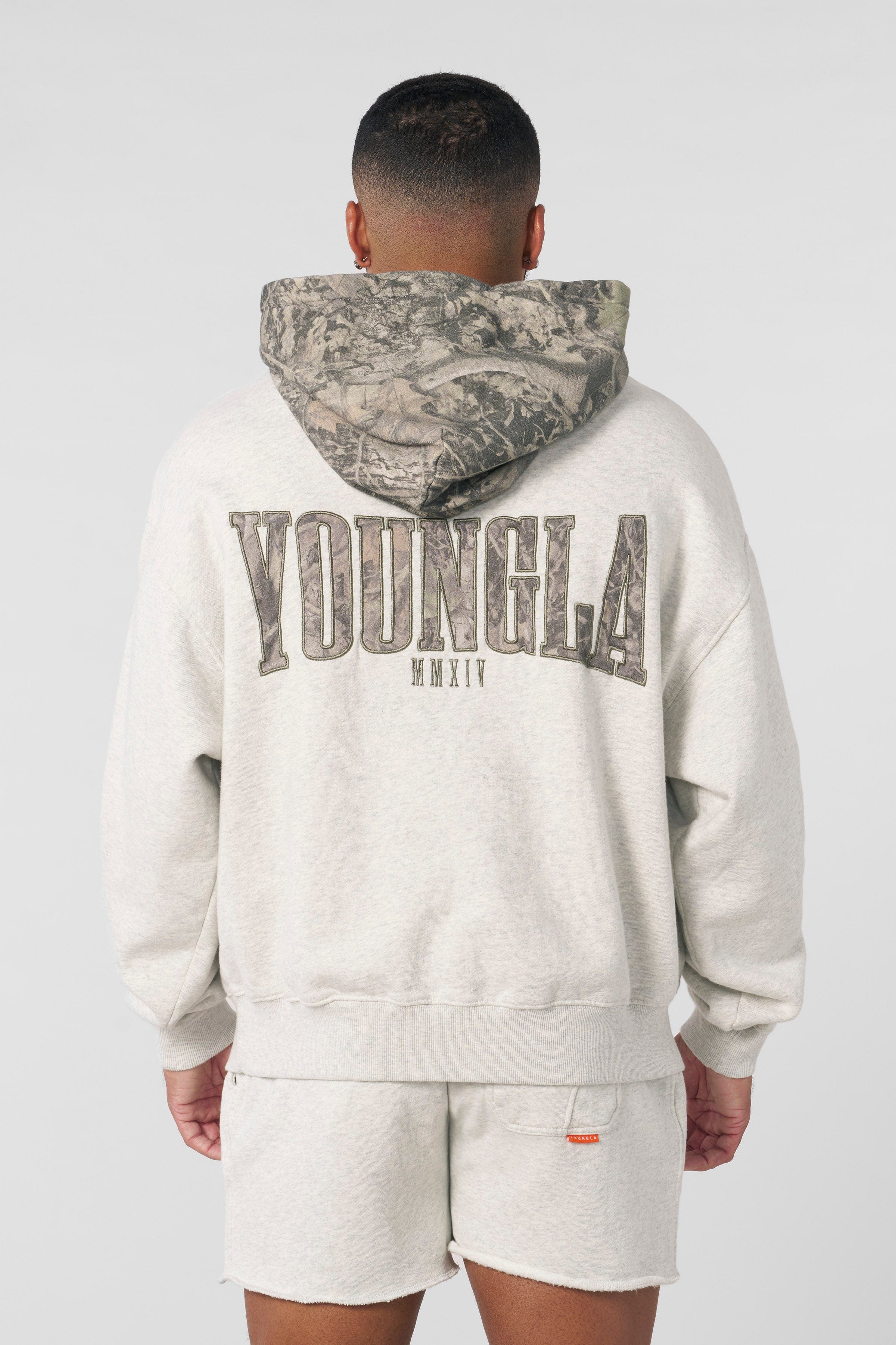 Side view of the tree camo hoodie, highlighting the unique camo pattern.