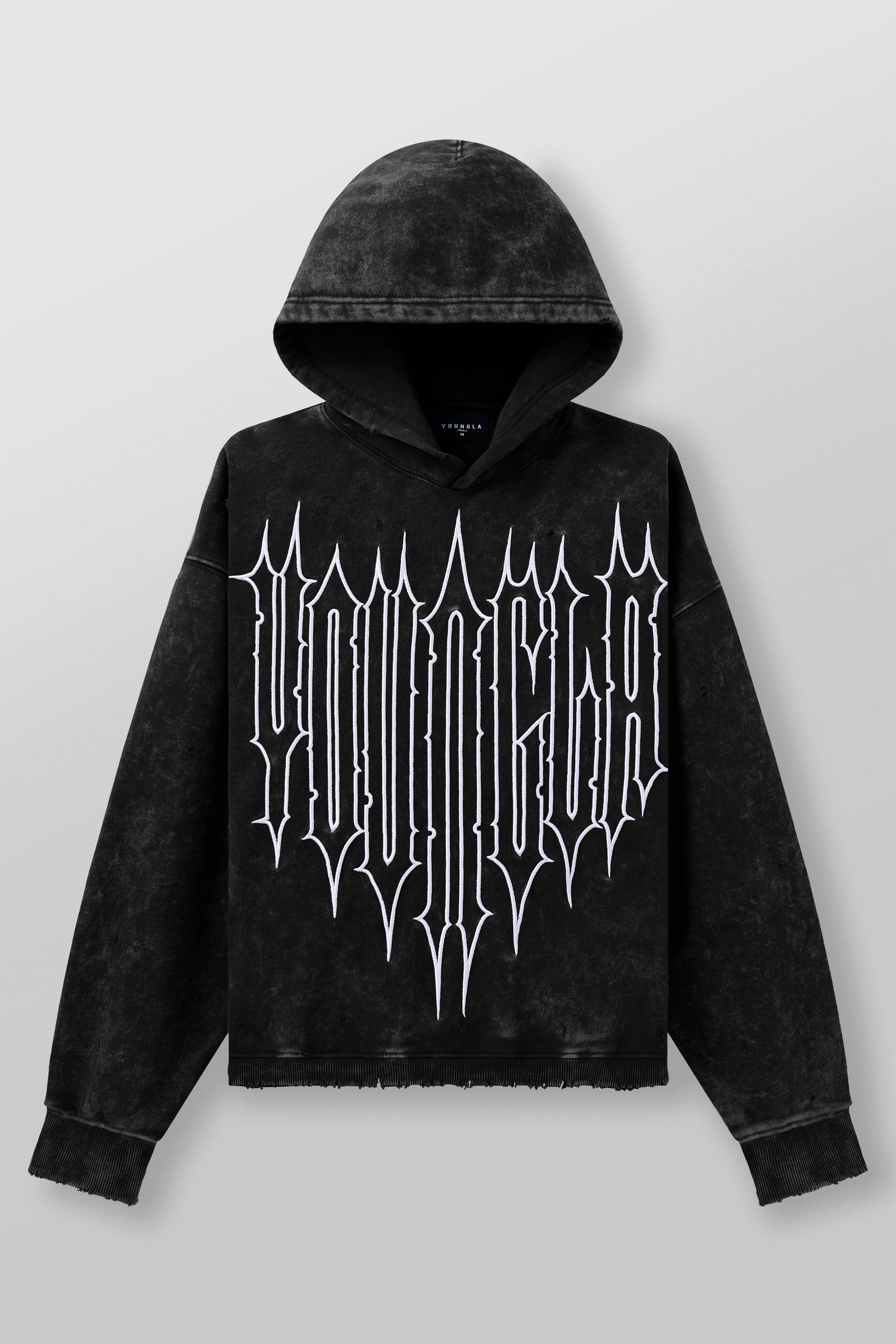Close-up of embroidered Revenge logo on the oversized zip up hoodie
