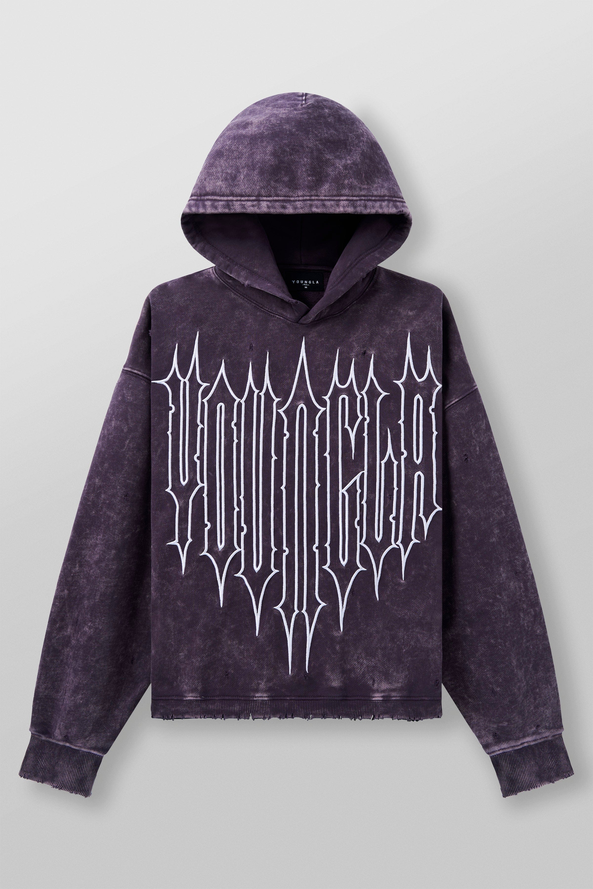 Front view of acid wash oversized hoodie worn casually outdoors
